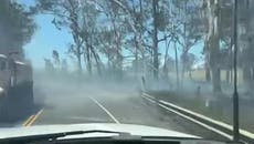 Hawaii: Roadside devastated as Hurricane Dora and wildfire tears through island