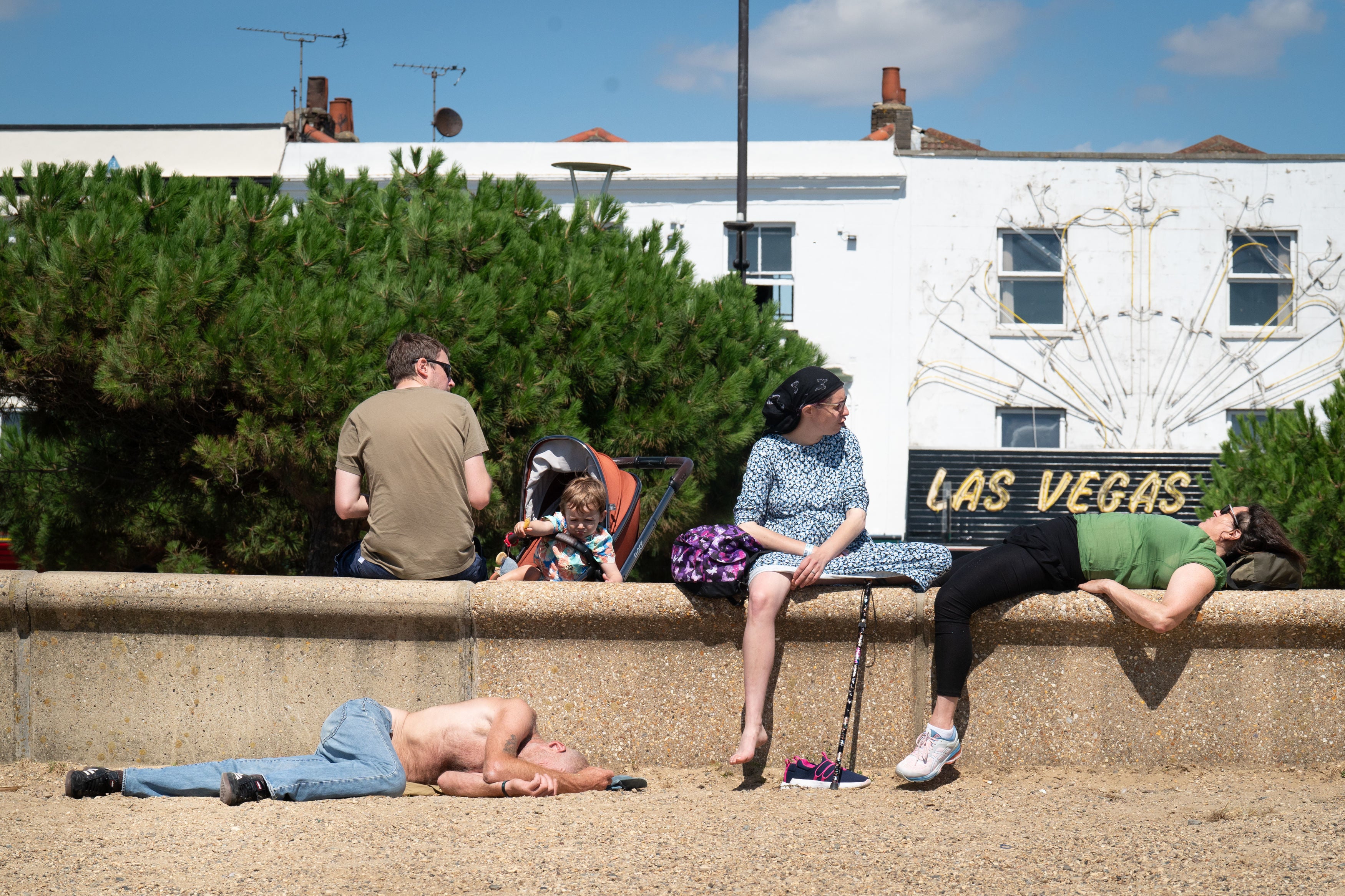 Beachgoers enjoy the warmer weather in Southend-on-Sea