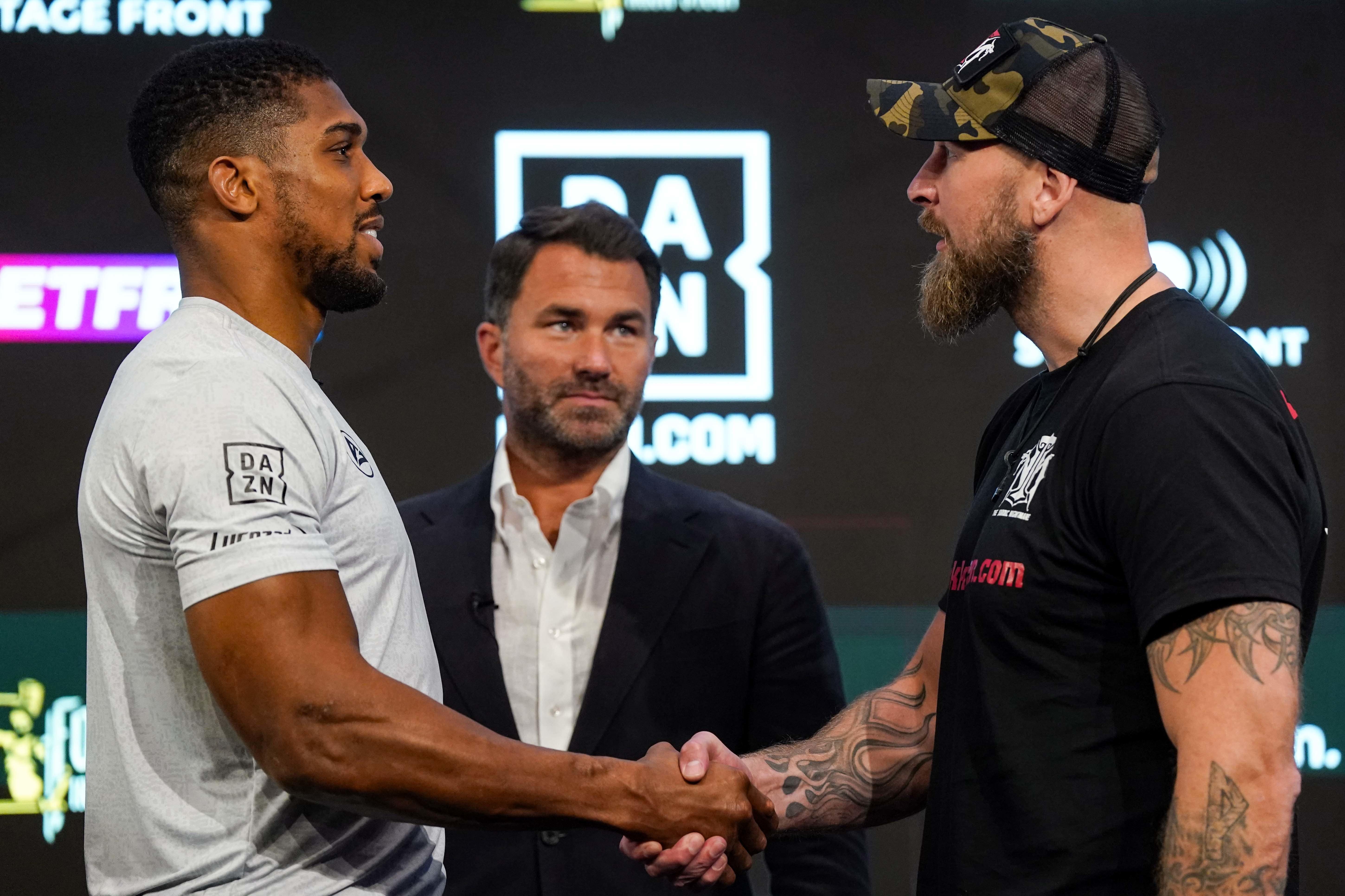 Joshua and Helenius at their pre-fight press conference – the pair sparred in 2017, as Joshua prepared for his fight with Wladimir Klitschko