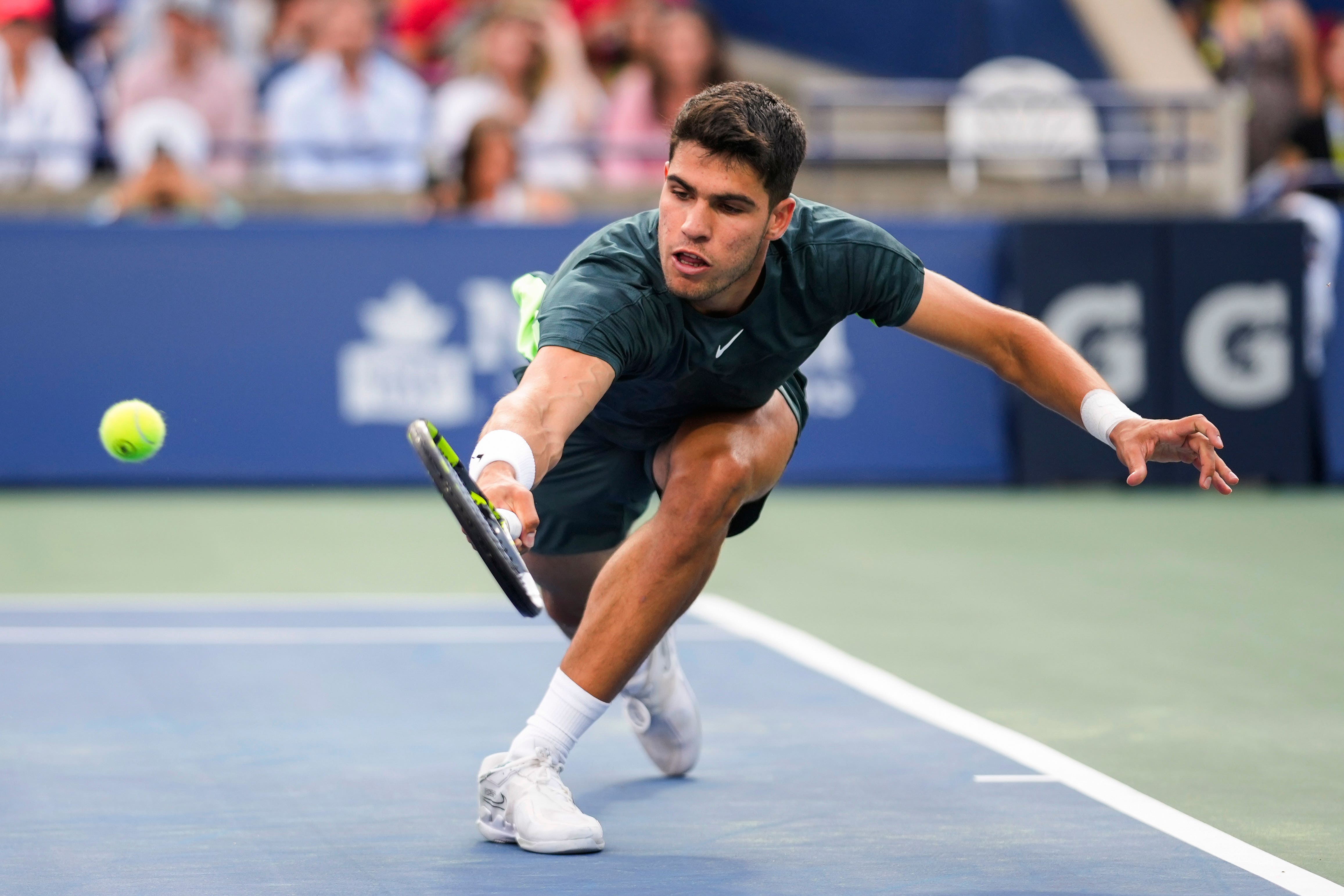 Spain’s Carlos Alcaraz reaches for a shot from United States’ Ben Shelton (Mark Blinch/The Canadian Press via AP)