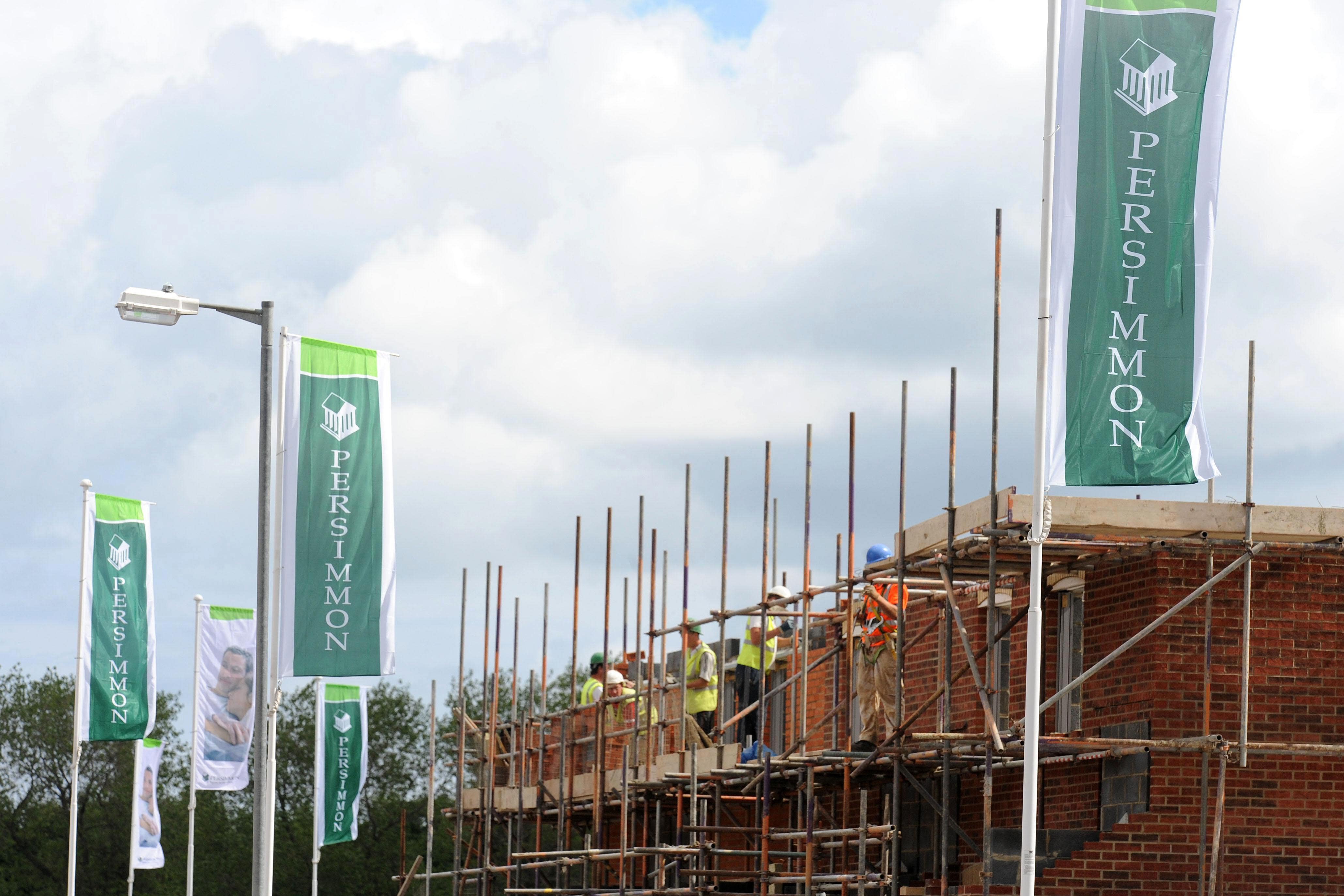 Persimmon said its revenue had dropped significantly as house sales fell (Owen Humphreys/PA)