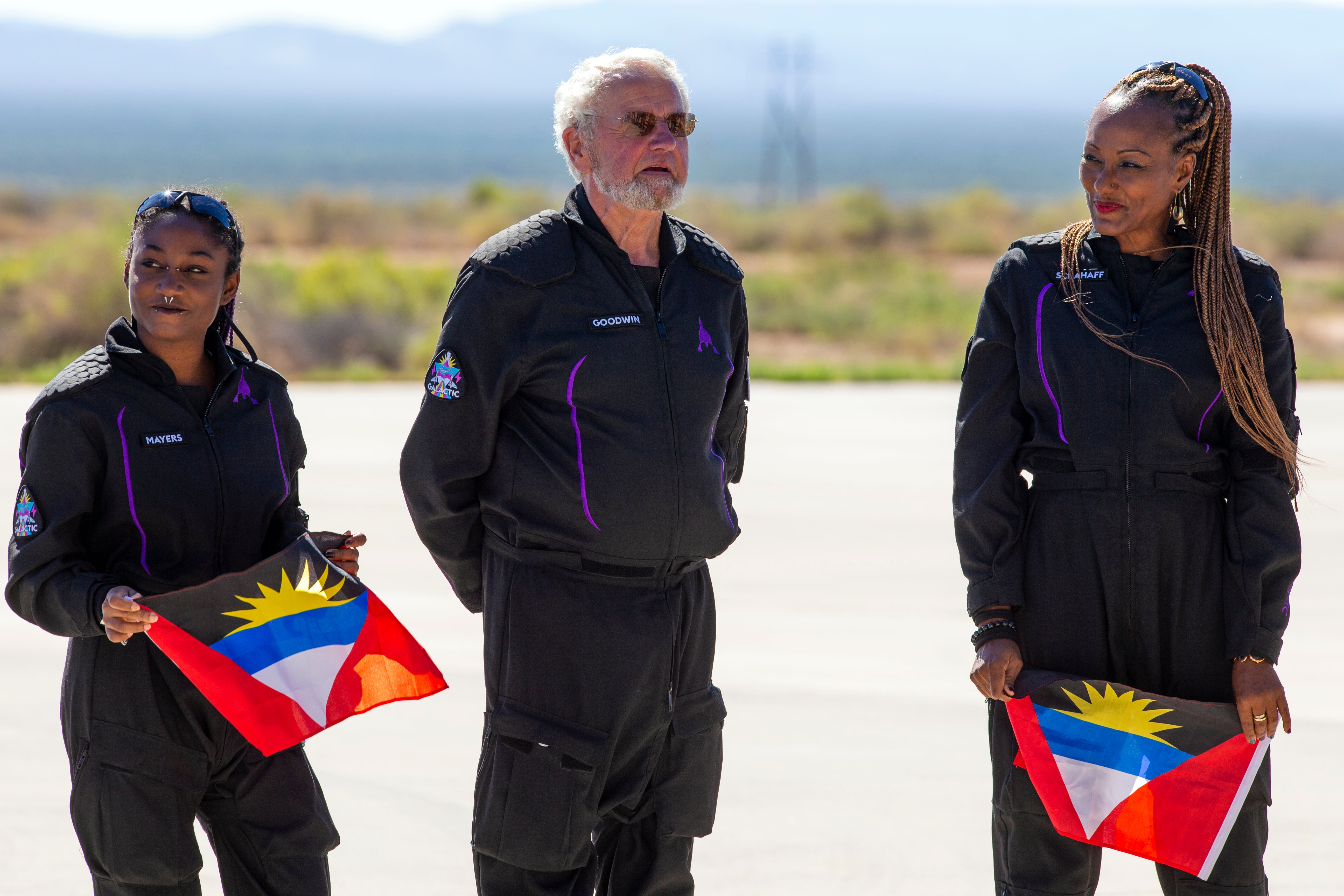 Left to right: Anastatia Mayers, Jon Goodwin, and Keisha Schahaff back on terra firma