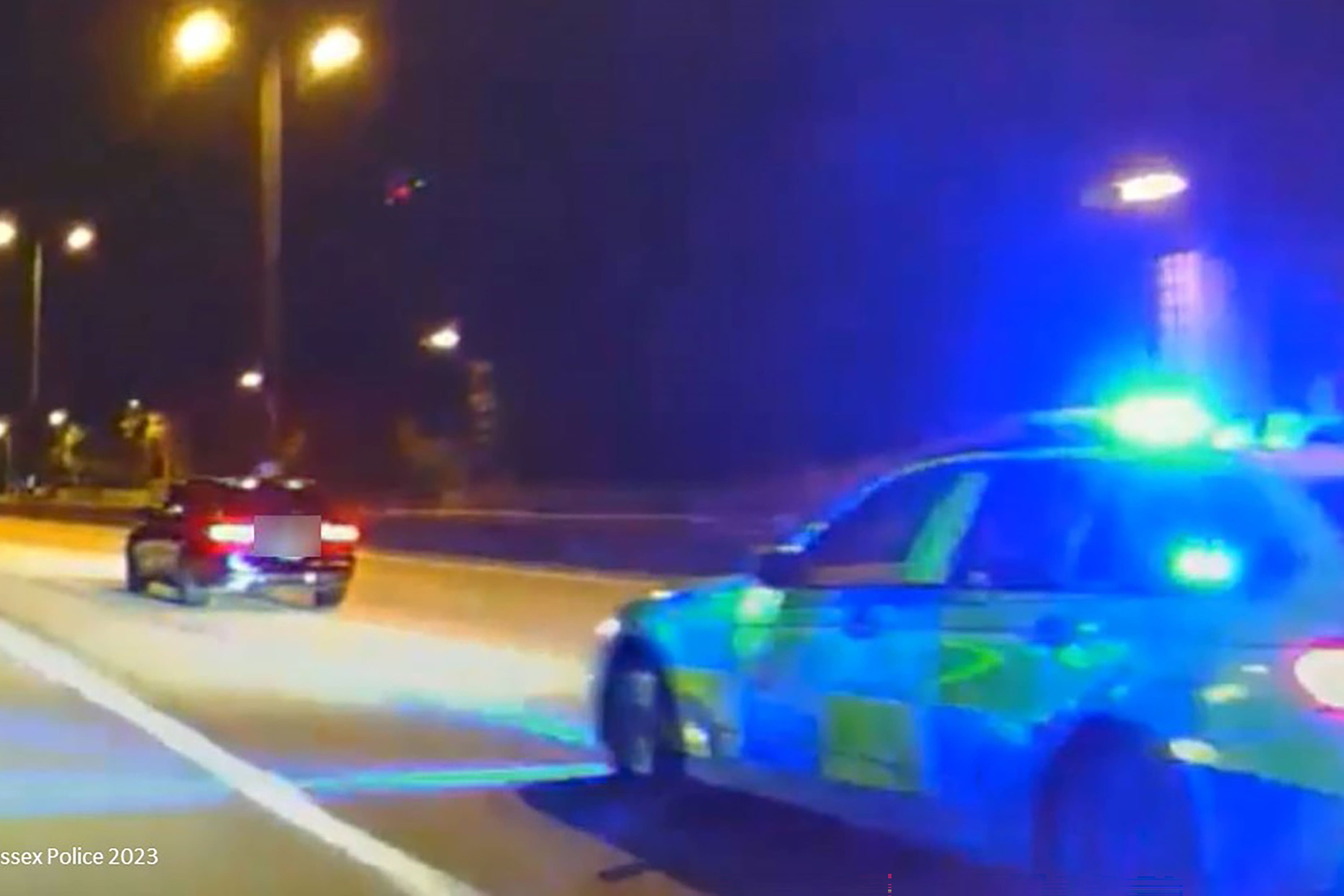 A stolen taxi being pursed by police (Sussex Police/PA)