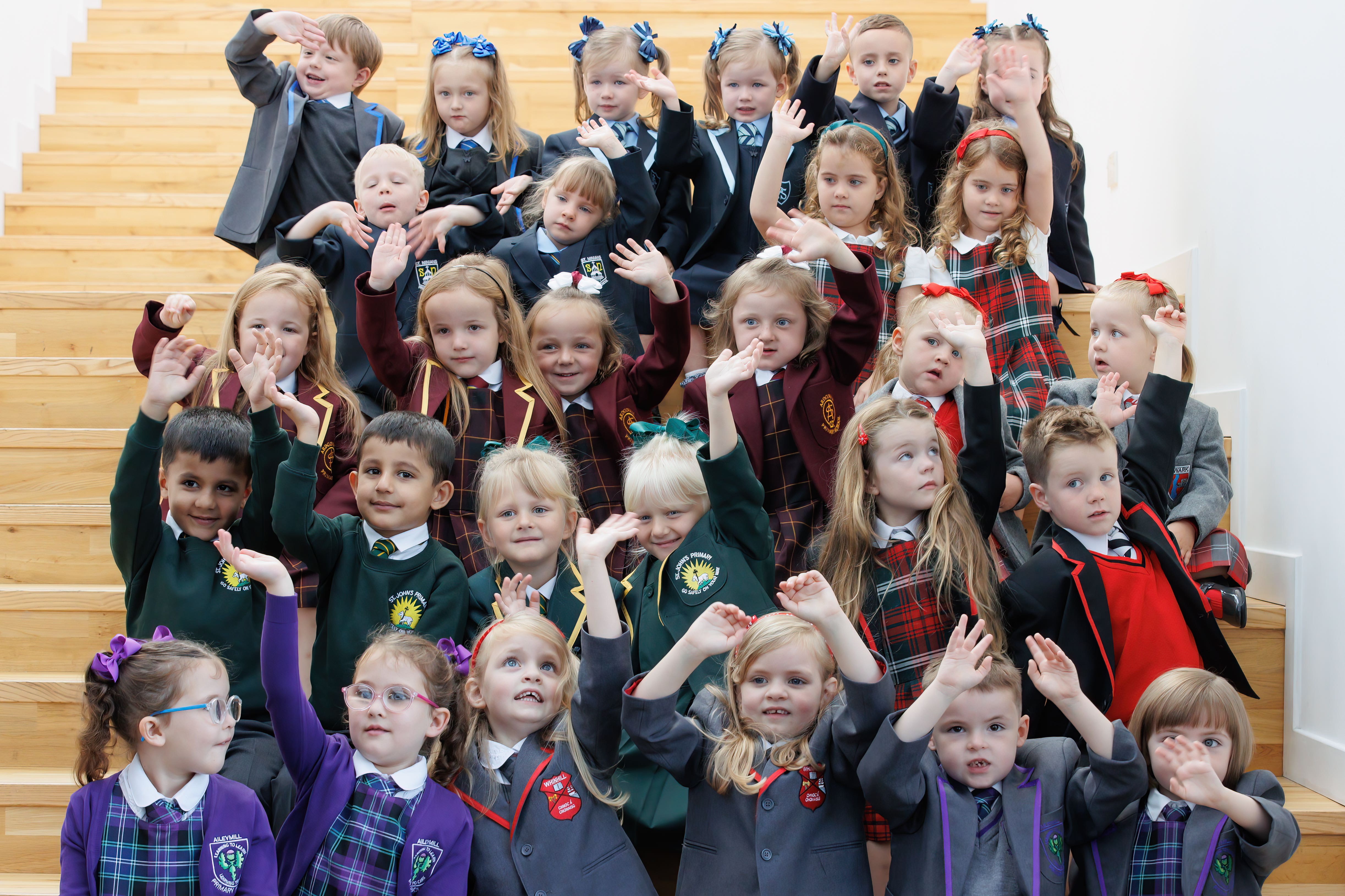 Inverclyde schools will welcome 17 sets of twins – 15 shown here – when the term starts (Steve Welsh/PA)