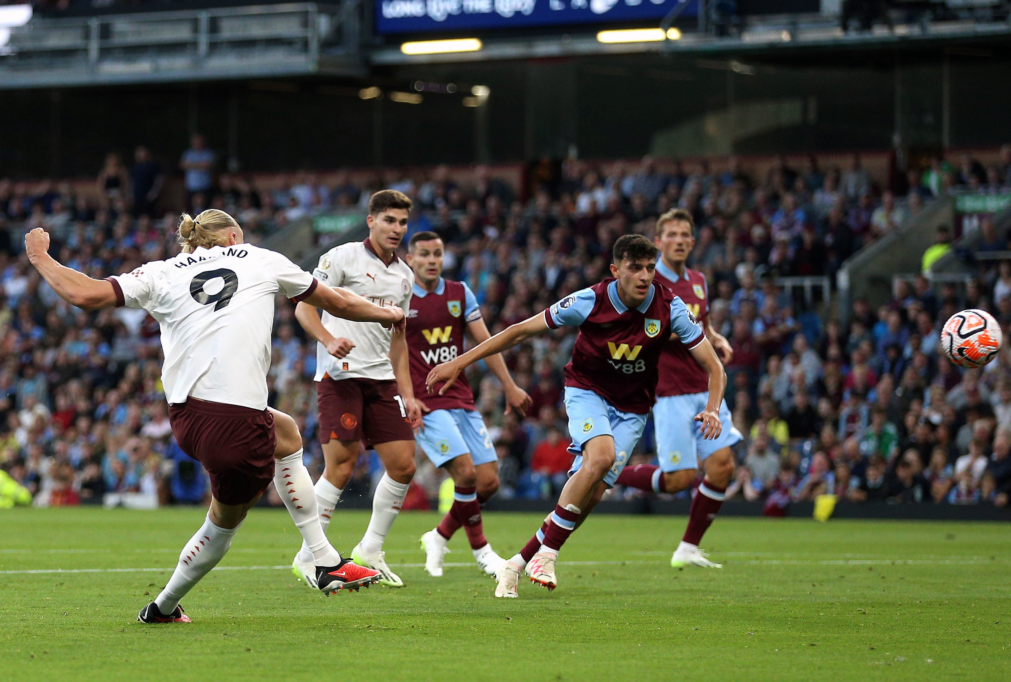 Erling Haaland scores his second goal with a curling left-footed strike