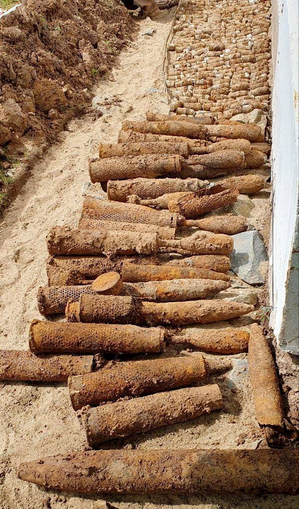 A handout photo made available by CMAC on 13 August 2023 shows thousands of unexploded ordnance that are left over from Cambodia’s civil war, after they were unearthed inside a school in Cambodia’s Kratie province