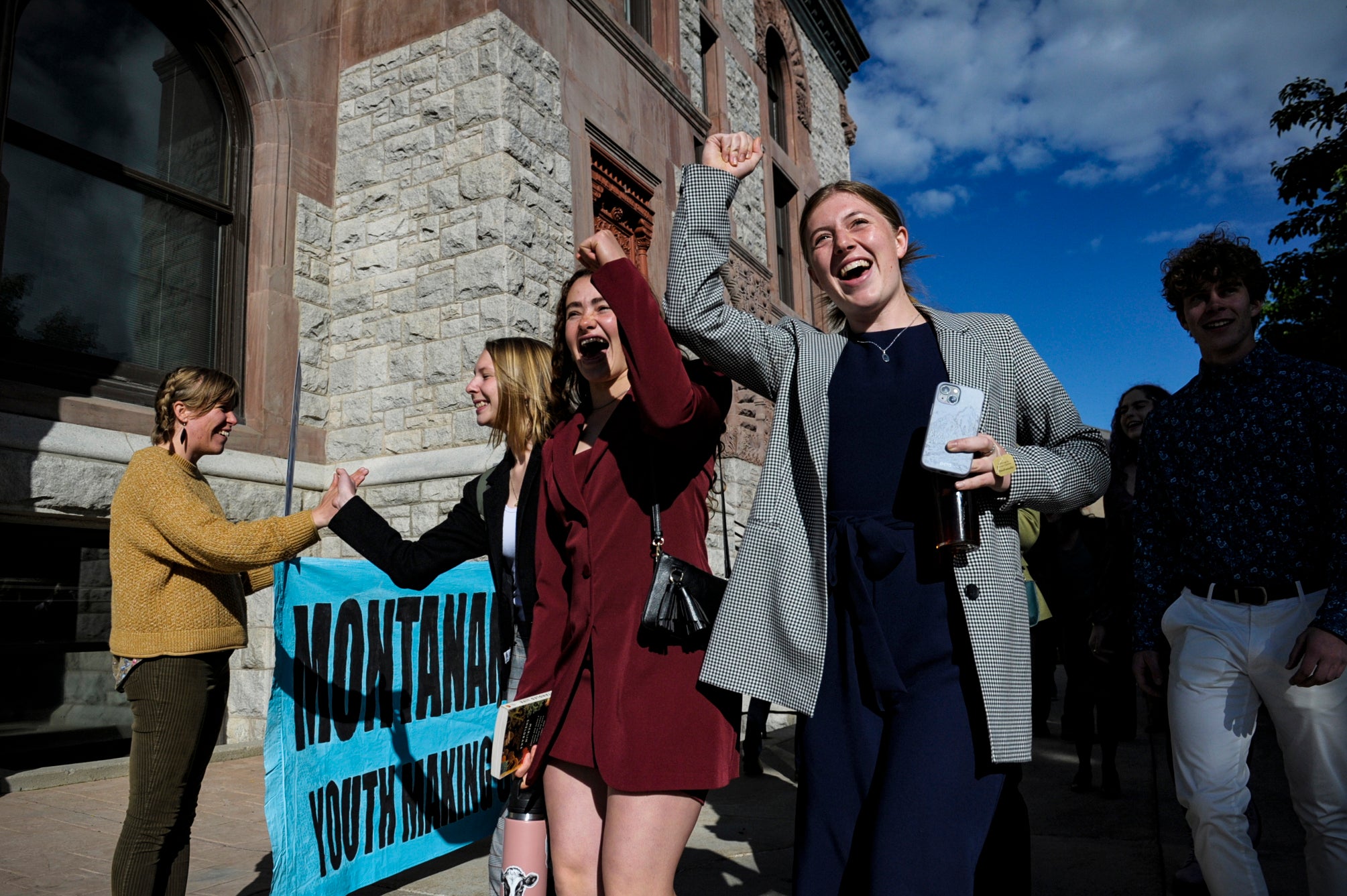 Youth plaintiffs in the climate change lawsuit, Held vs. Montana, arrive at the Lewis and Clark County Courthouse, on June 20, 2023, in Helena, Mont., for the final day of the trial. A Montana judge on Monday, Aug. 14, sided with young environmental activists who said state agencies were violating their constitutional right to a clean and healthful environment by permitting fossil fuel development without considering its effect on the climate.