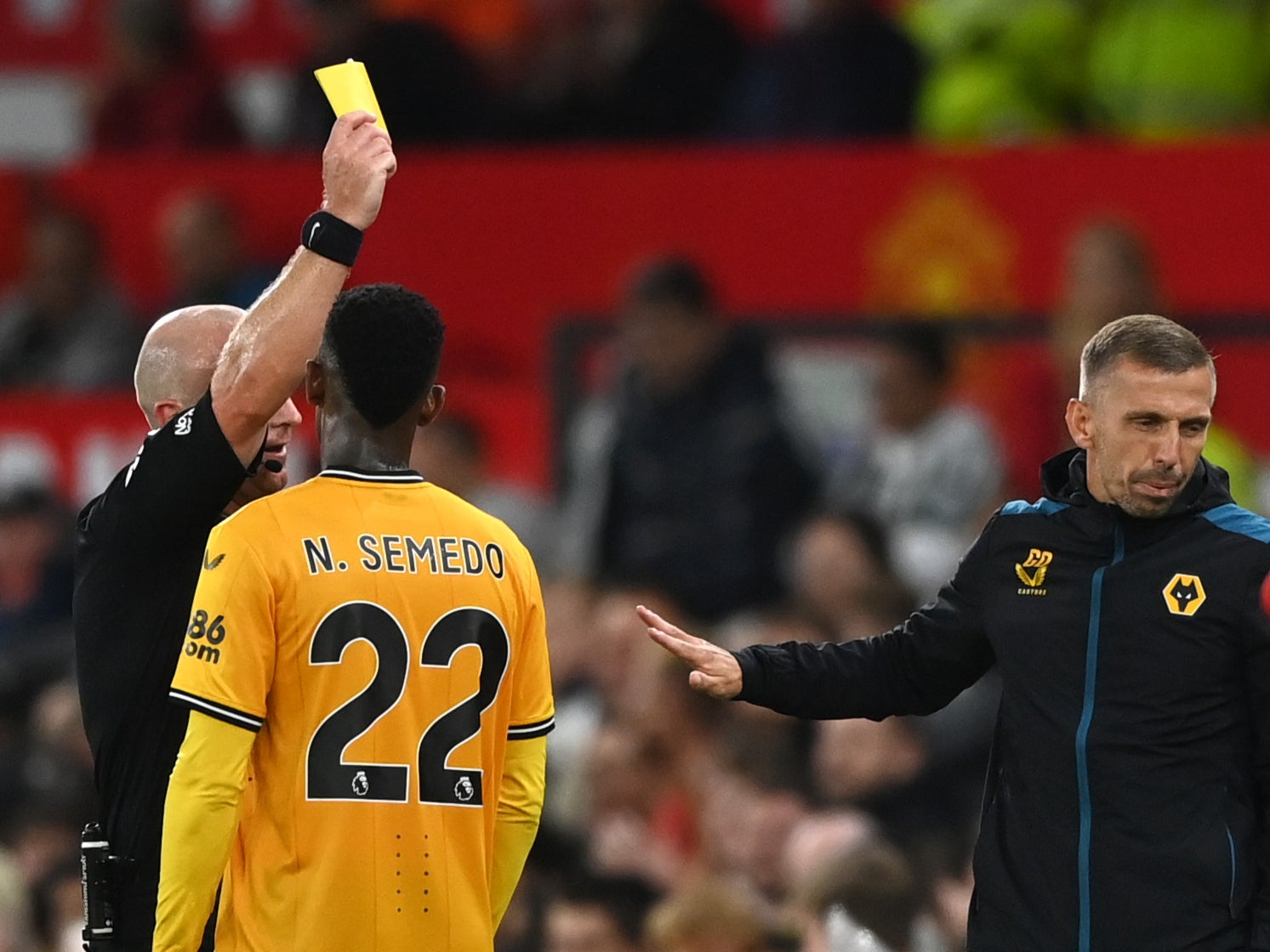 Wolves manager Gary O’Neil is shown the yellow card