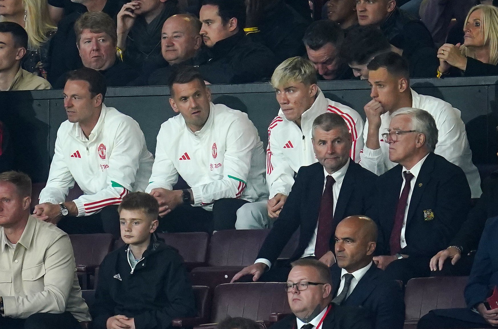 Rasmus Hojlund (second right, in white) watched from the stands as Manchester United edged past Wolves