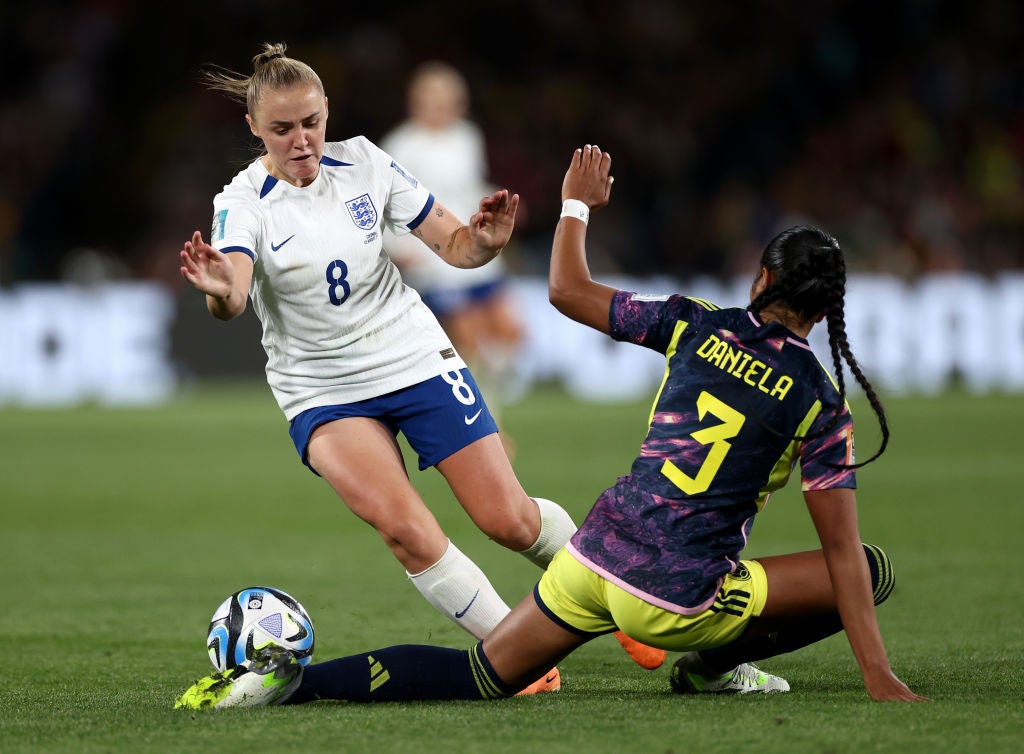 Stanway is challenged by Daniela Arias of Colombia during the quarter-final