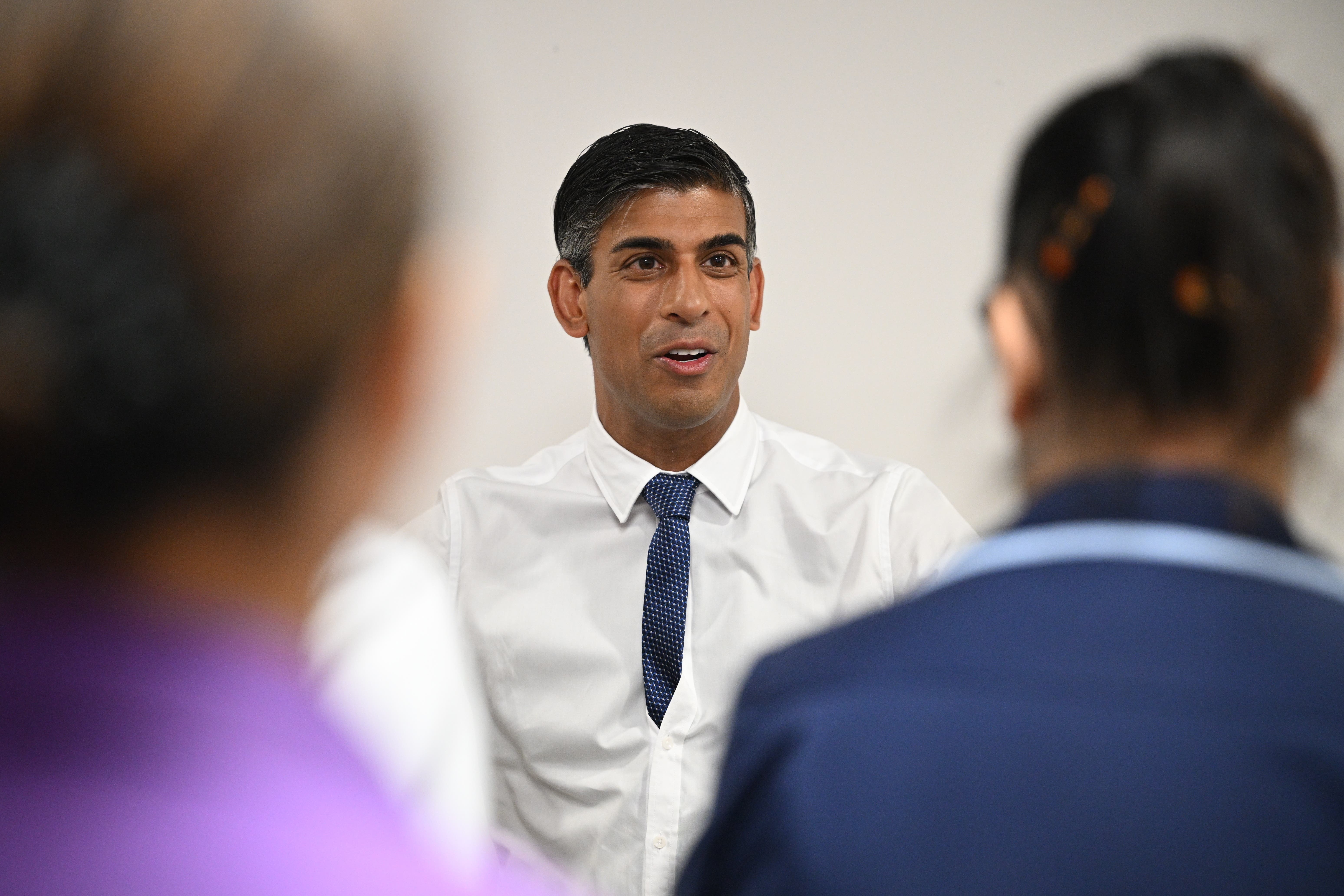 Prime Minister Rishi Sunak returned to work with a visit to Milton Keynes University Hospital (Leon Neal/PA)