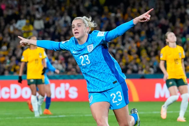 <p>Alessia Russo celebrates after scoring England’s decisive third goal</p>