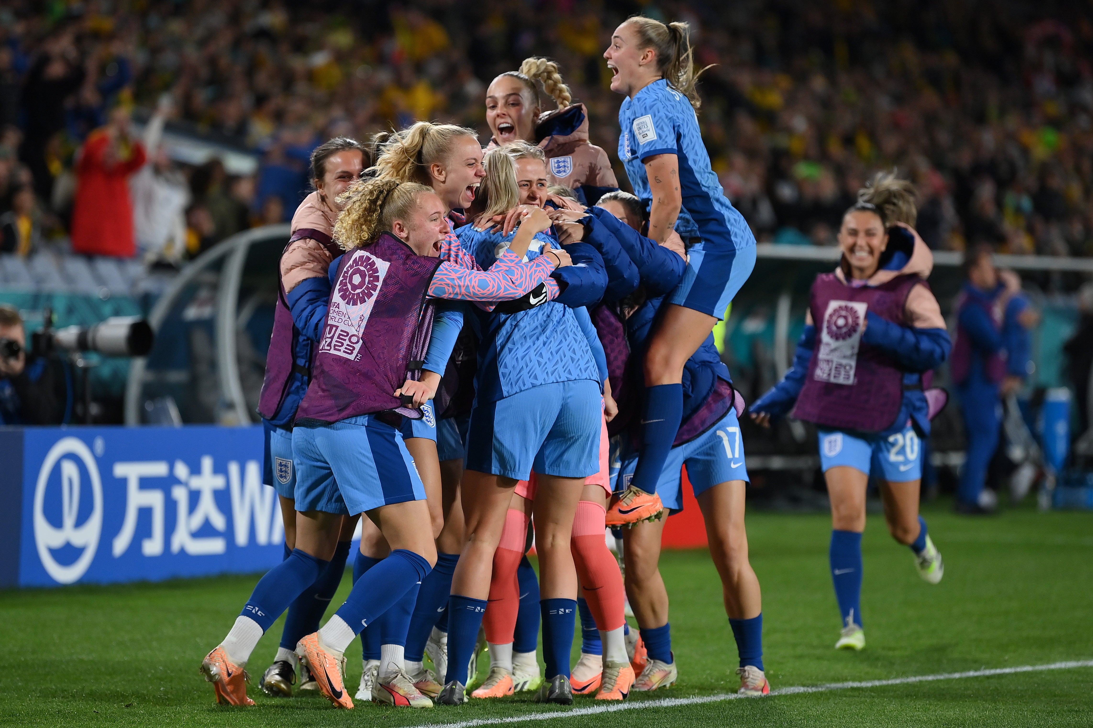 England celebrate following their 3-1 victory over Australia in the Women’s World Cup semi-final