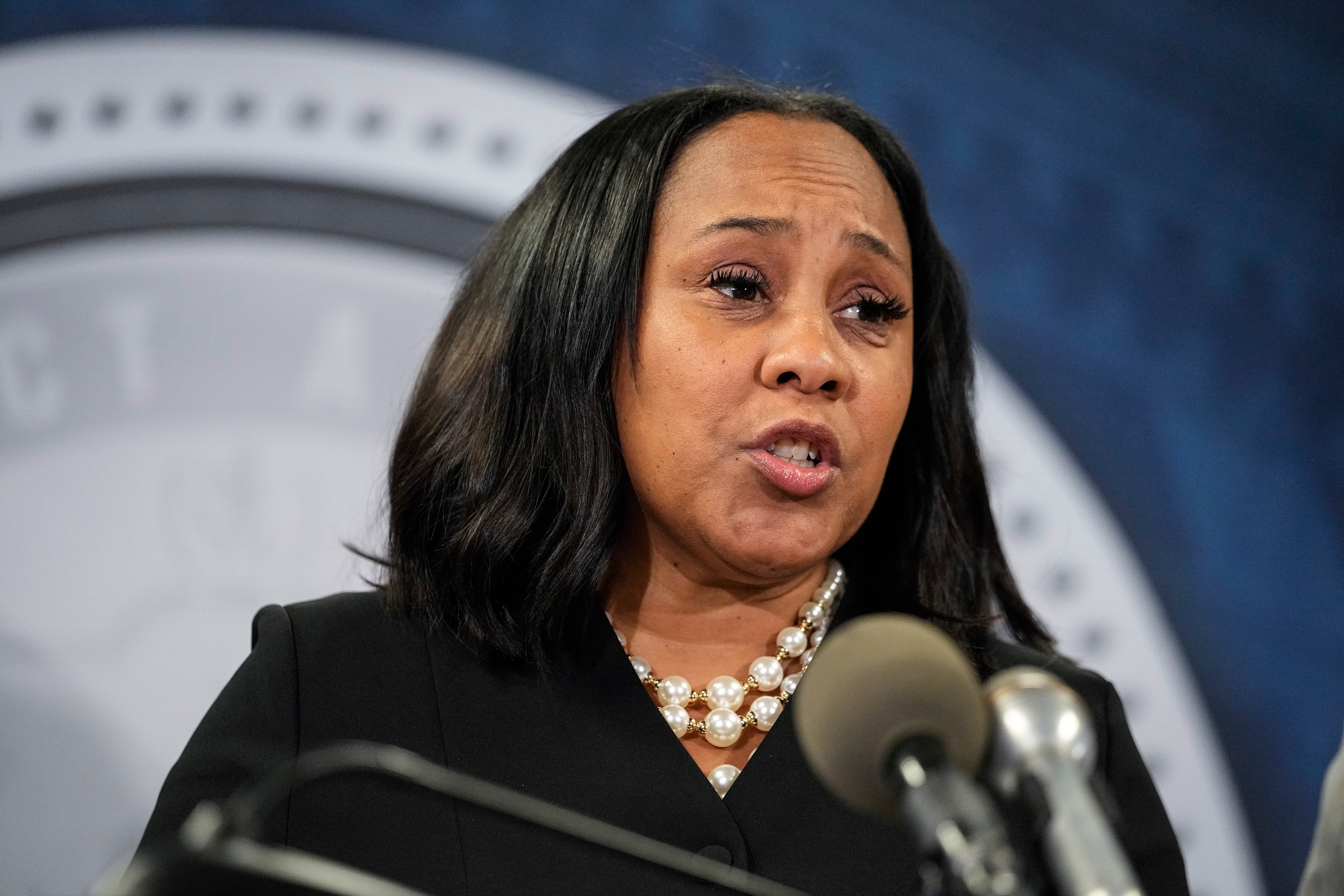 Fulton County District Attorney Fani Willis speaks in the Fulton County Government Center during a news conference, Monday, Aug. 14, 2023, in Atlanta.