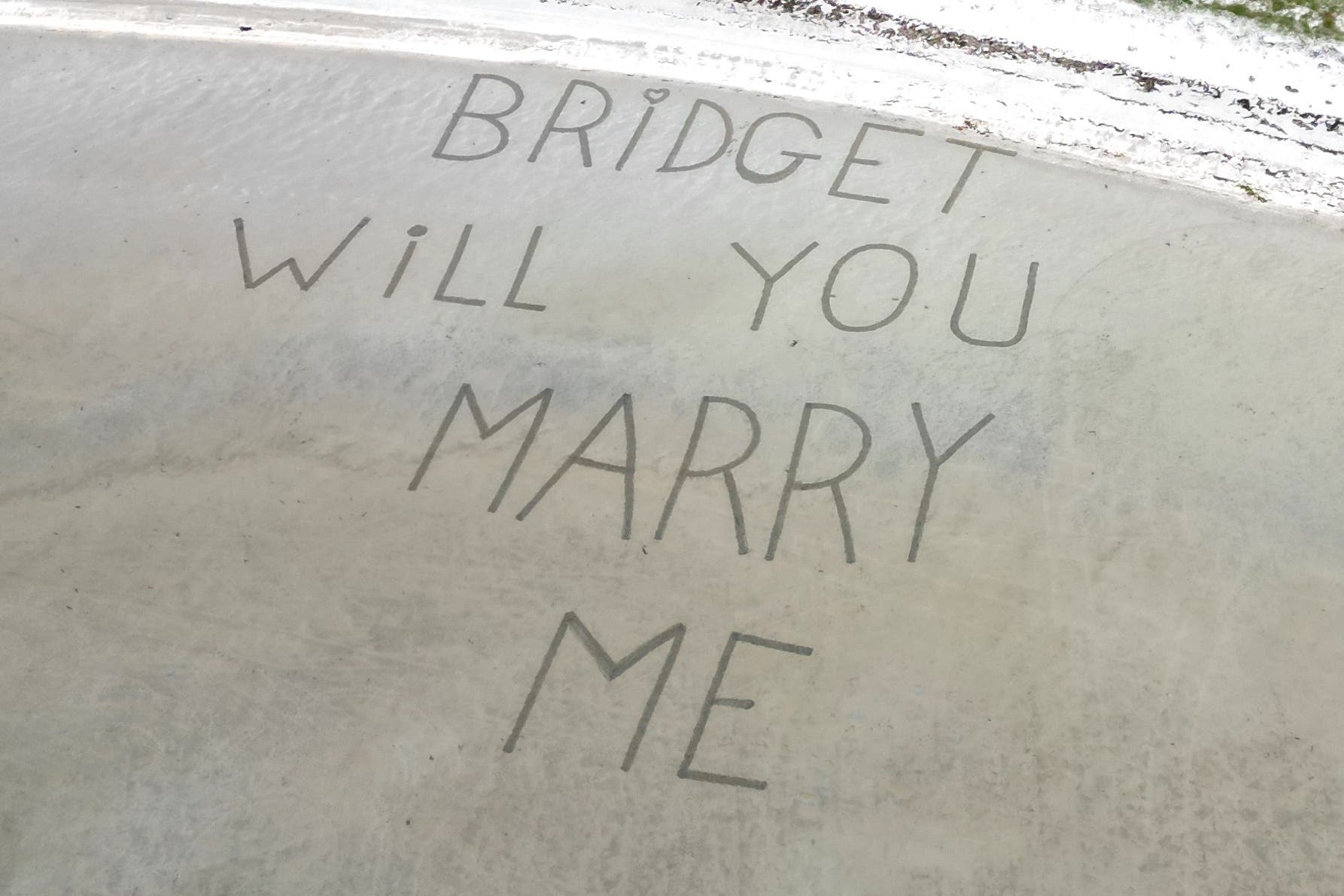 Airport staff wrote Mr McCann’s proposal to his partner in the sand (Stephen McCann/Big Partnership/PA)