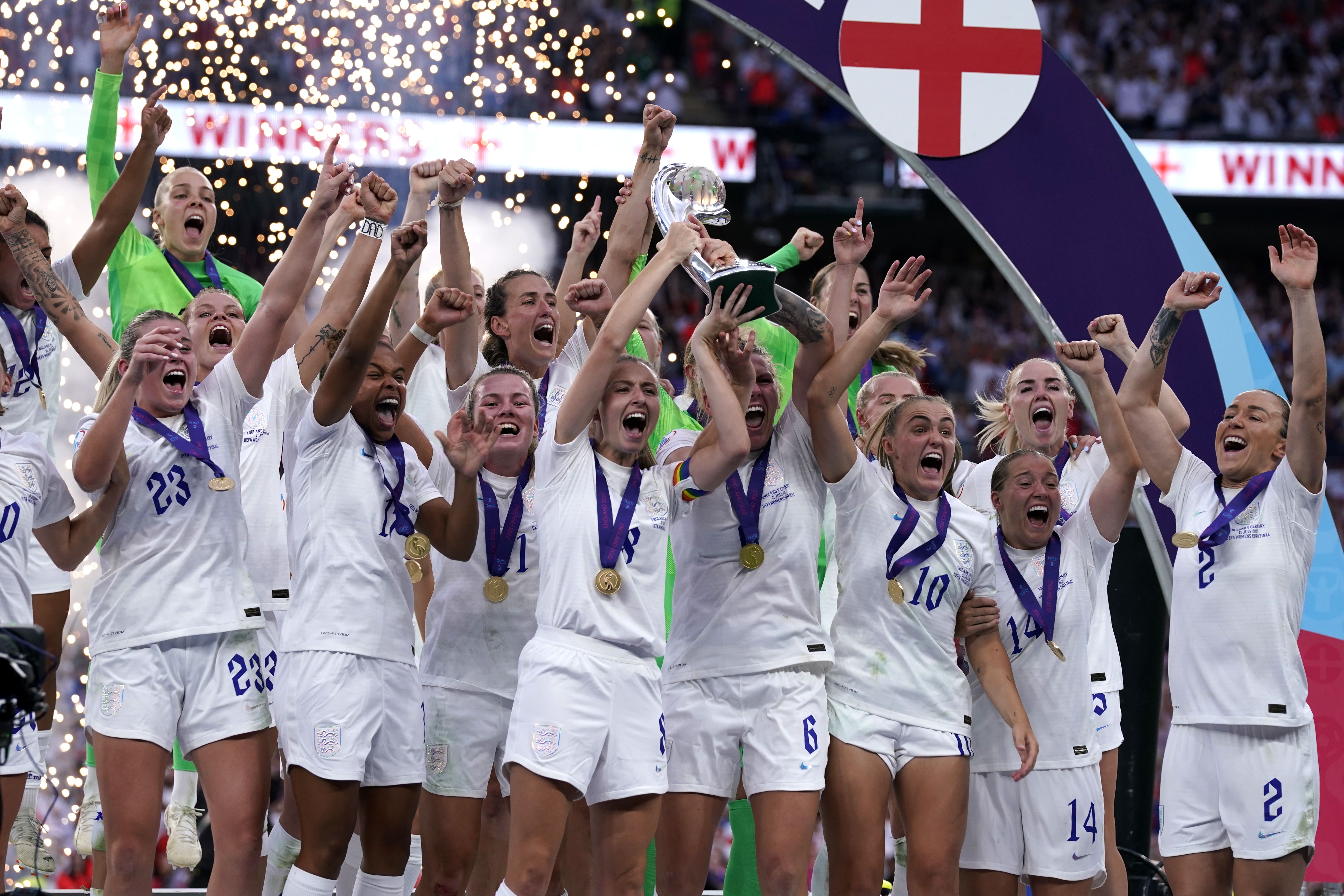 England players celebrate with the trophy following victory over Germany in the Euro 2022 final at Wembley (Danny Lawson/PA)