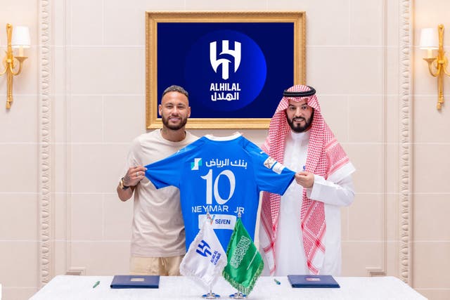 <p>Neymar poses with Al-Hilal President Fahad bin Nafel</p>