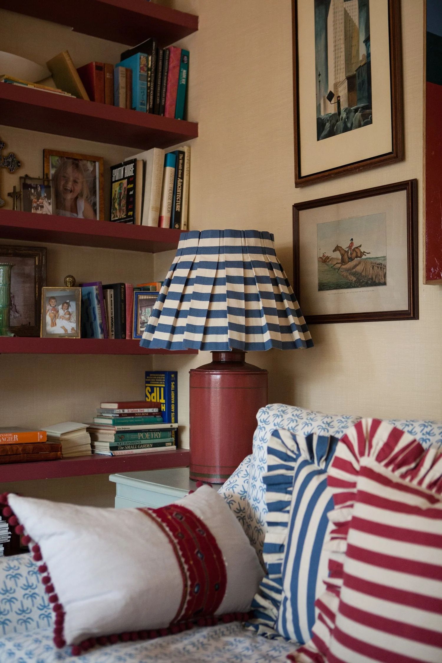 Alice Palmer’s Tangier Denim and Tangier Red stripe frilly cushions enhance a nautical interior palette