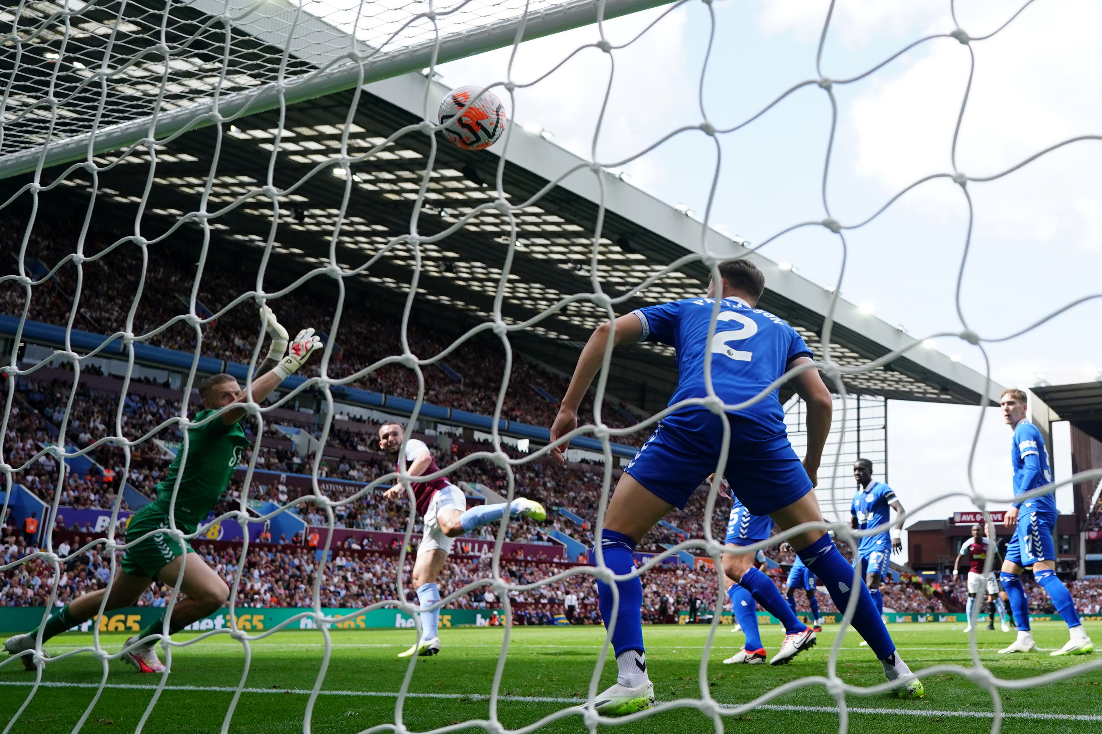 Aston Villa captain John McGinn, second left, opened the scoring against Everton (David Davies/PA)