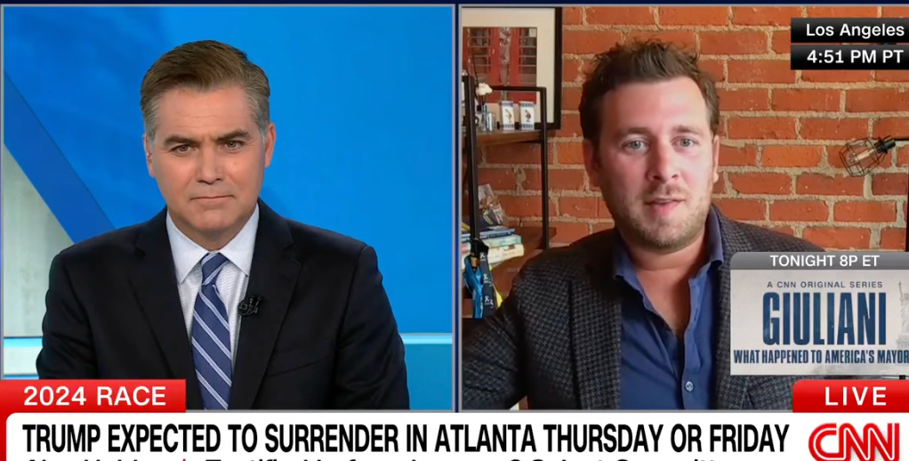 Alex Holder, right, told CNN’s Jim Acosta that Donald Trump requires ‘constant adoration’