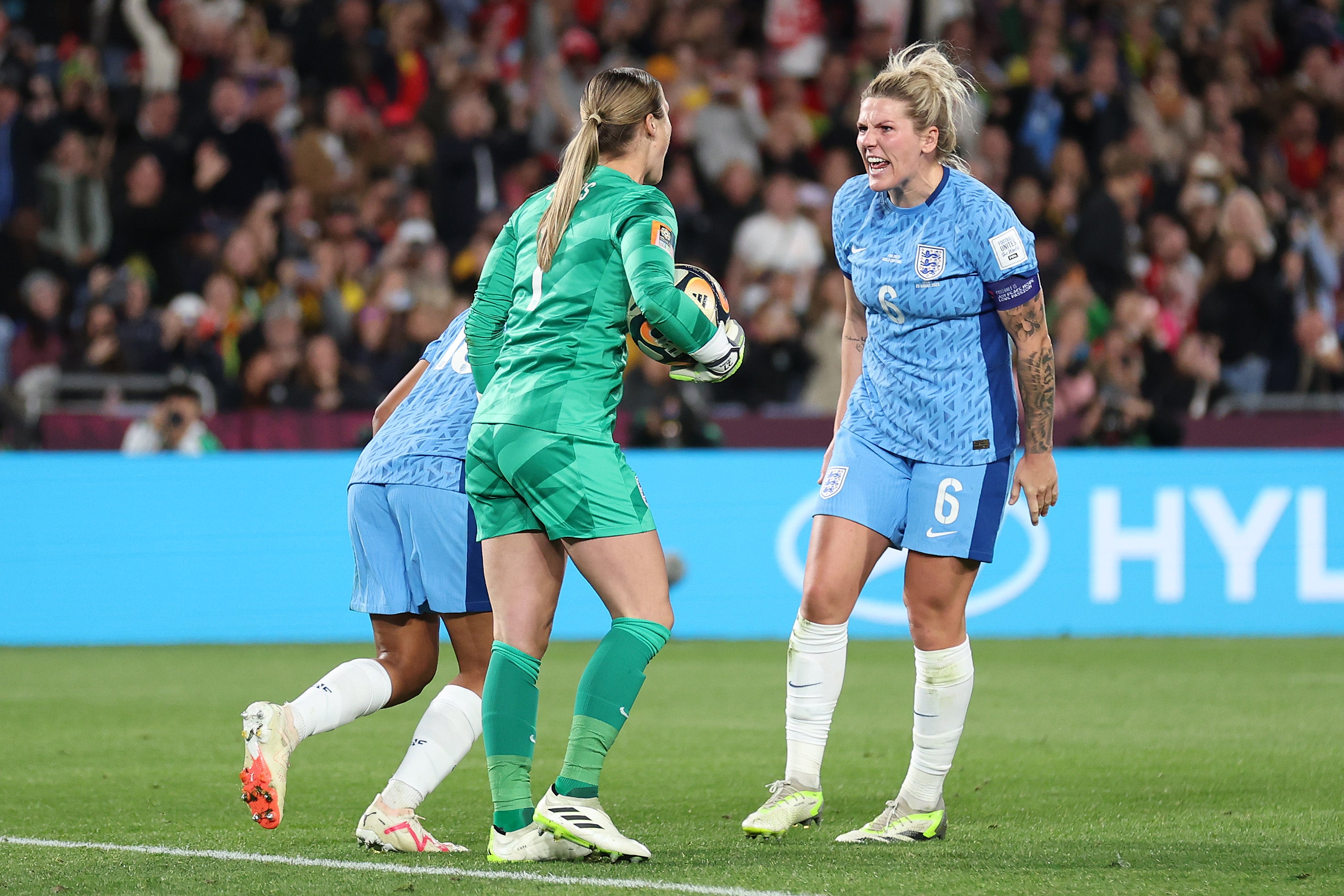 England captain Millie Bright screams in celebration after Mary Earps’ penalty save