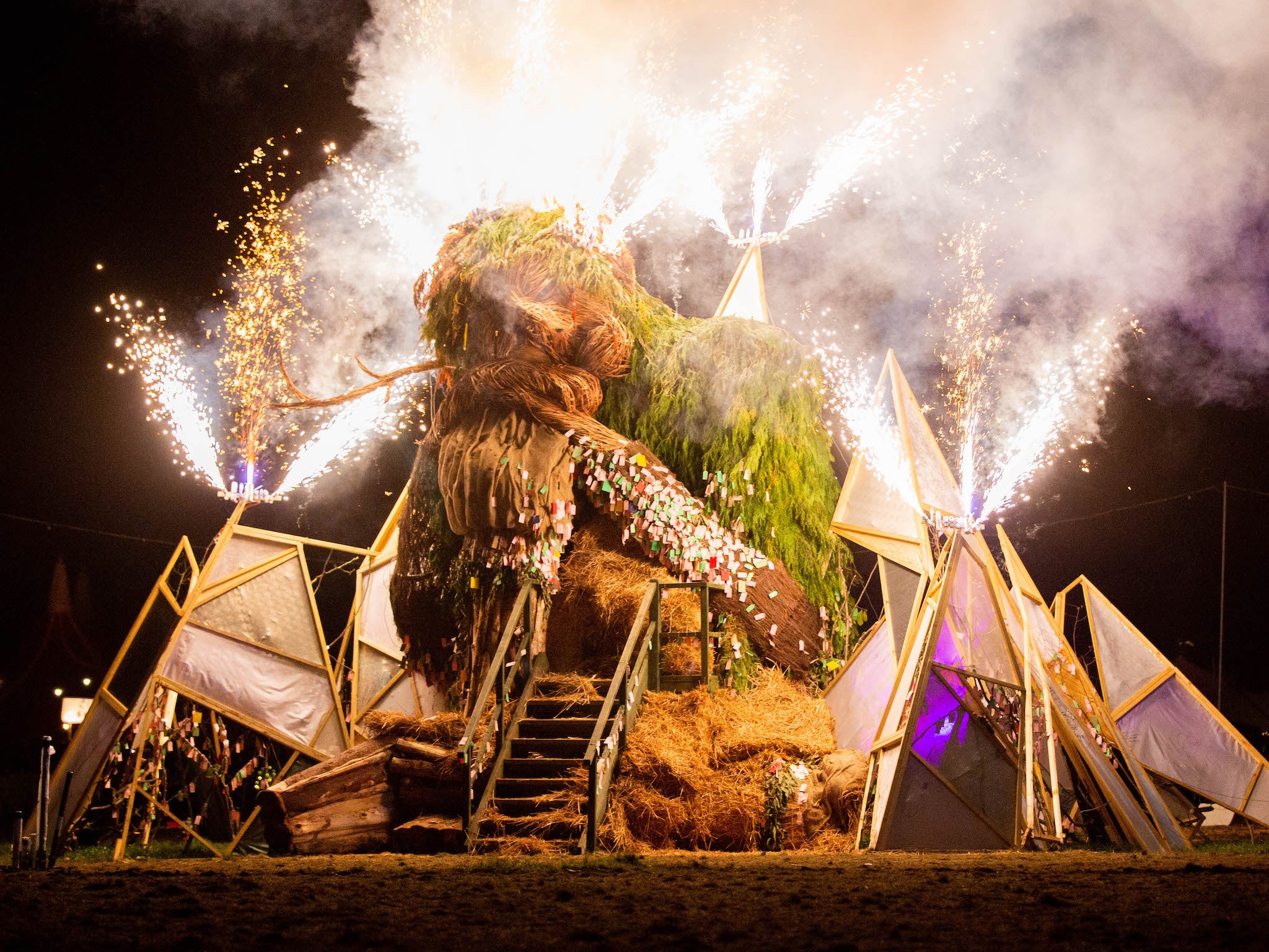 The wicker man catches light in a barrage of fireworks on the final day of Green Man festival 2023