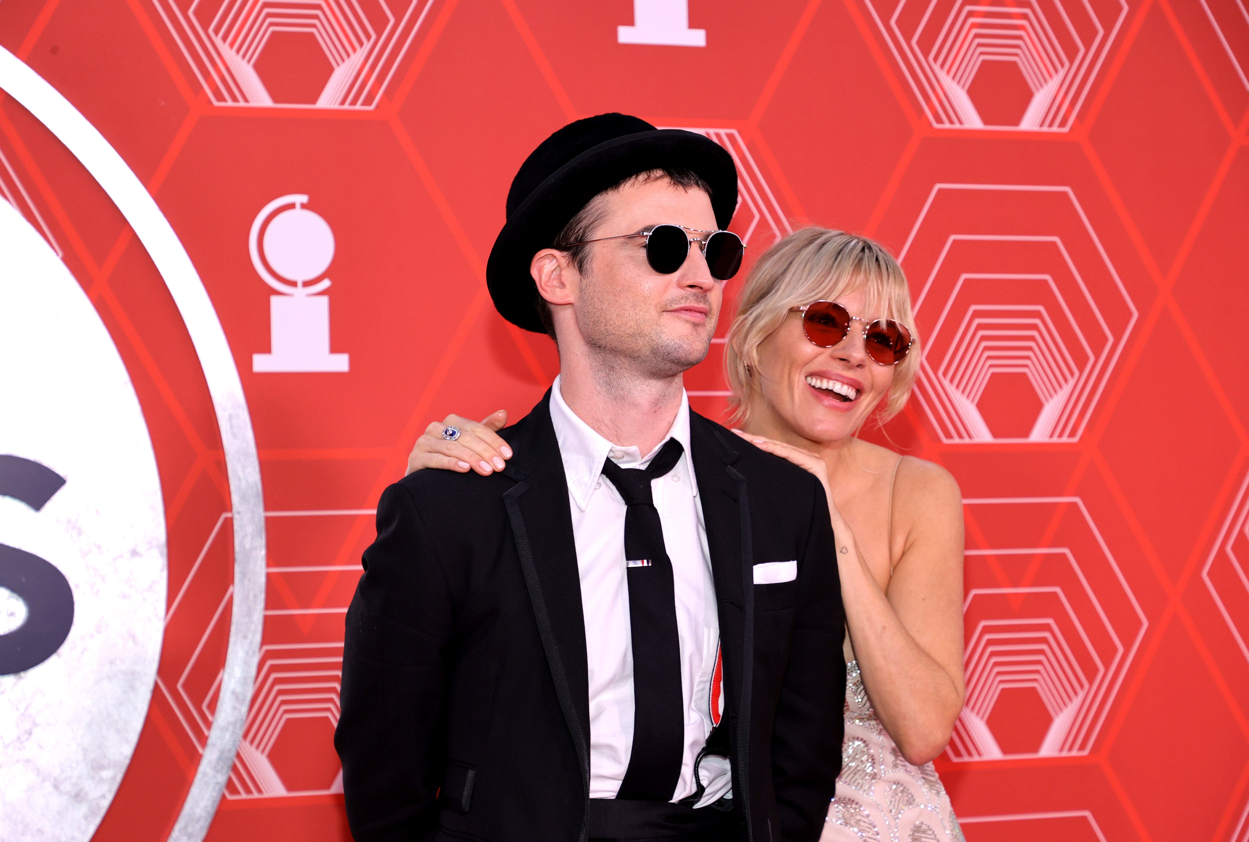 Tom Sturridge and Sienna Miller attend the 74th Annual Tony Awards at Winter Garden Theater on September 26, 2021