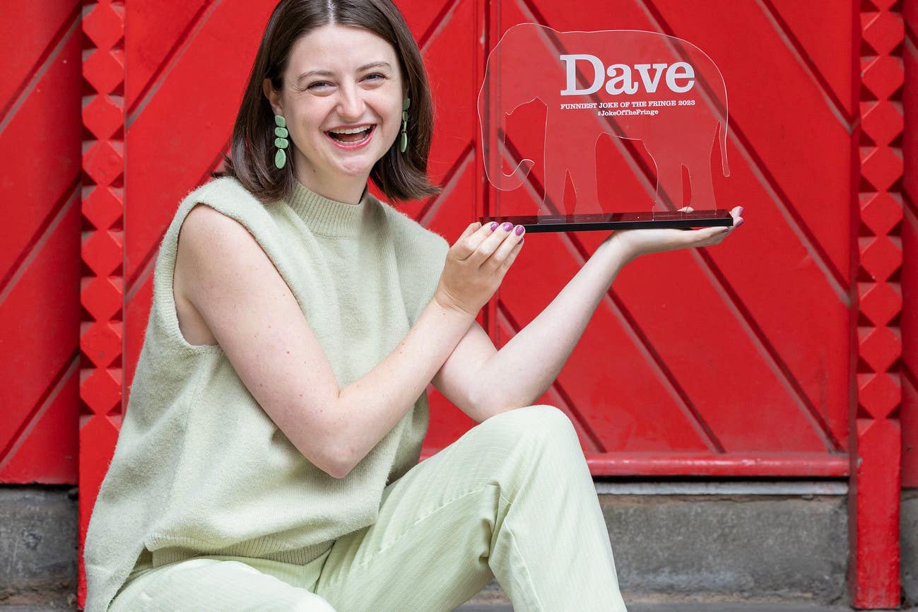 Lorna Rose Treen with her best joke award (PA)