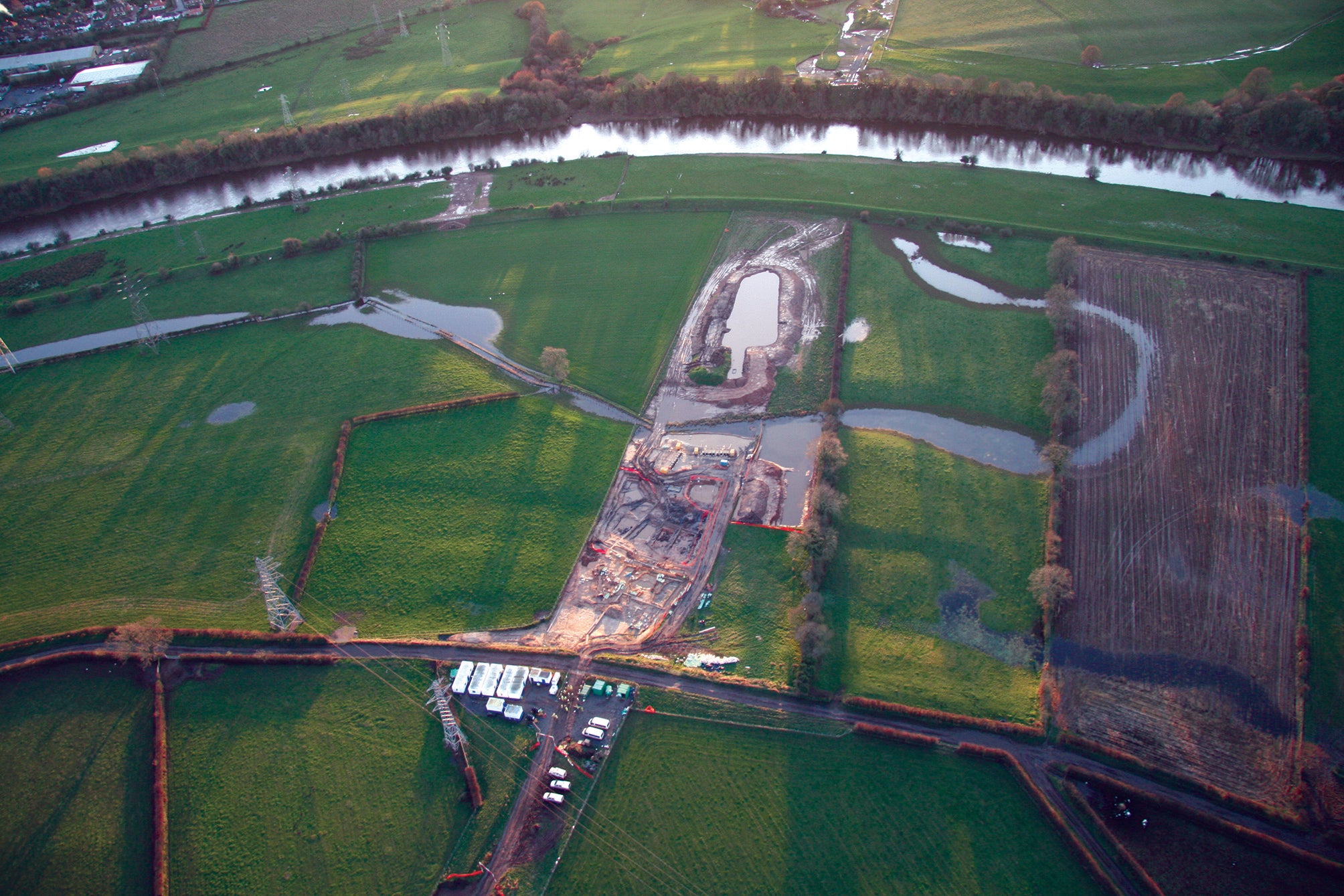 Archaeologists working at Stainton West near Carlisle, taking samples of the soil from the ancient river bed where evidence of human activity was found. The soil samples were later analysed to reveal information about the climate, plants, insects, and animals present there during the Stone Age.