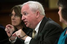 Trump lawyer John Eastman surrenders in Fulton County