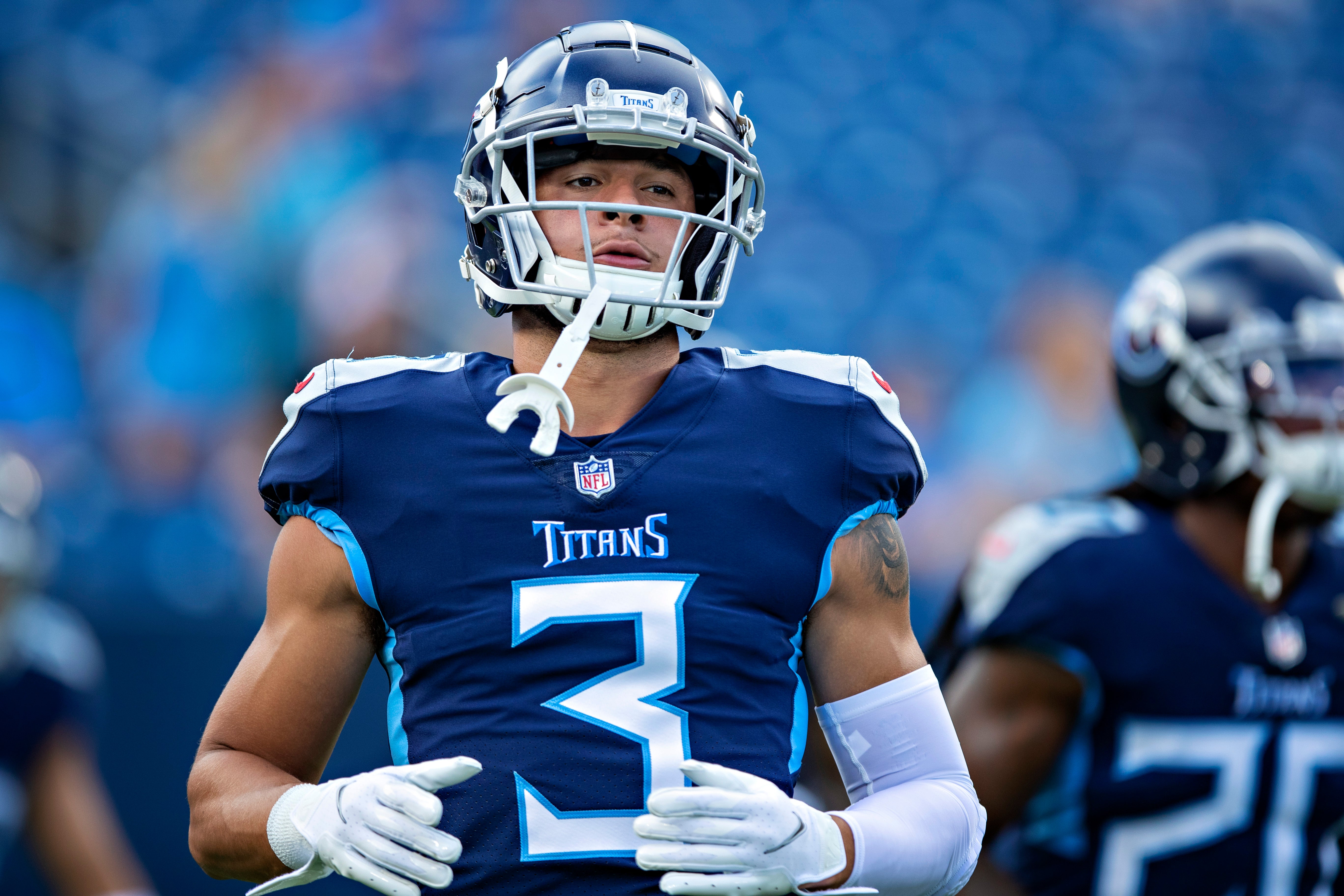 Caleb Farley of the Tennessee Titans warms up before an NFL preseason game against the Chicago Bears at Nissan Stadium in Nashville, Tennessee, in August 2021.