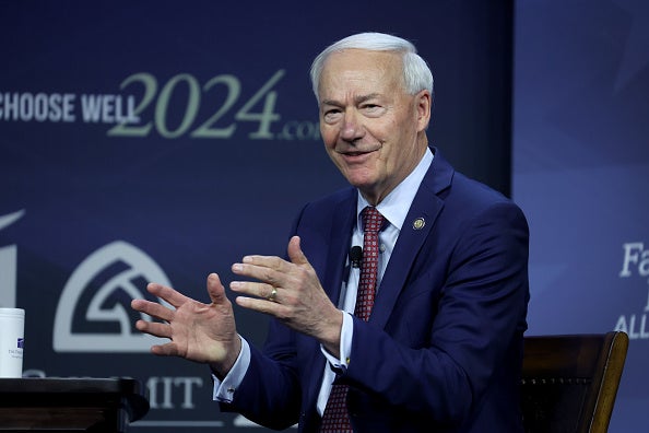 Republican presidential candidate, former Arkansas Gov. Asa Hutchinson speaks to guests at the Family Leadership Summit