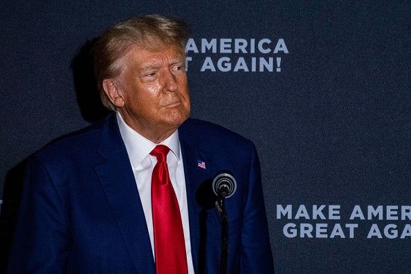 Former US President and 2024 presidential hopeful Donald Trump speaks during a campaign rally at Windham High School in Windham, New Hampshire