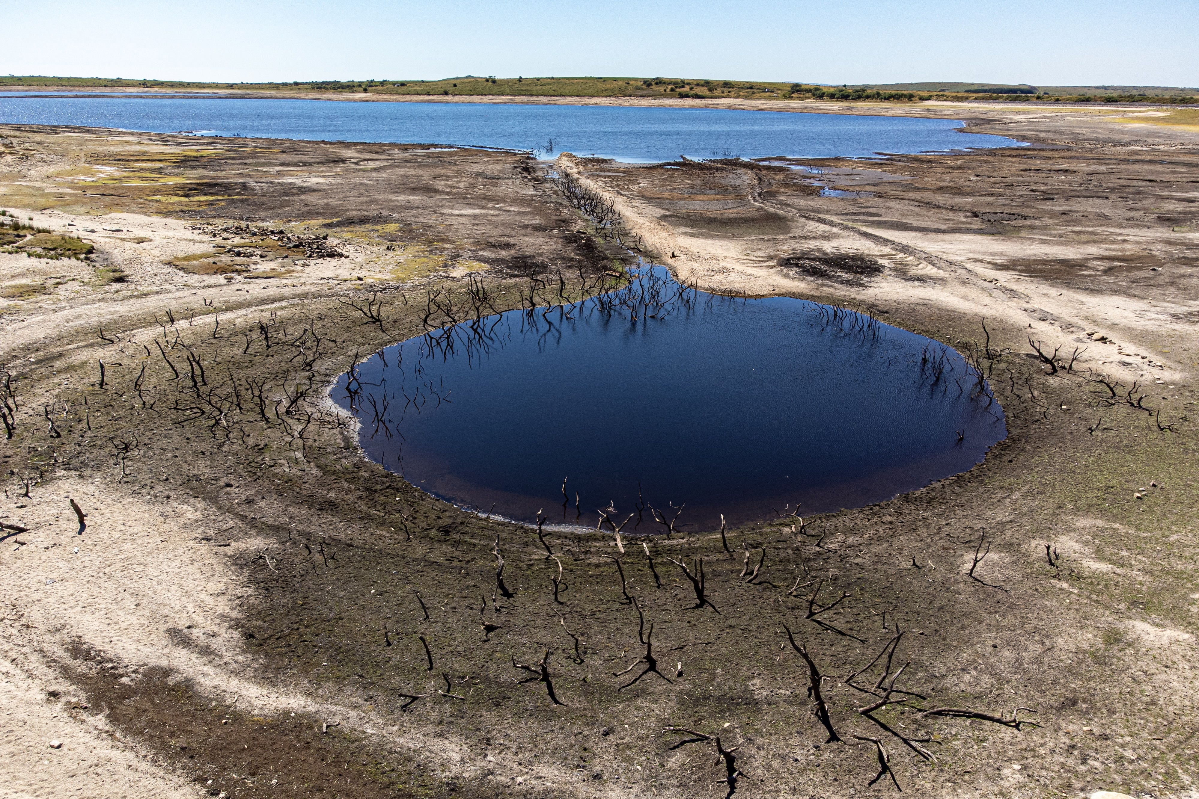 Much of Colliford reservoir in Cornwall dried up after the relentlessly dry weather in 2022, with many people subject to a hosepipe ban for a year (Ben Birchall/PA)