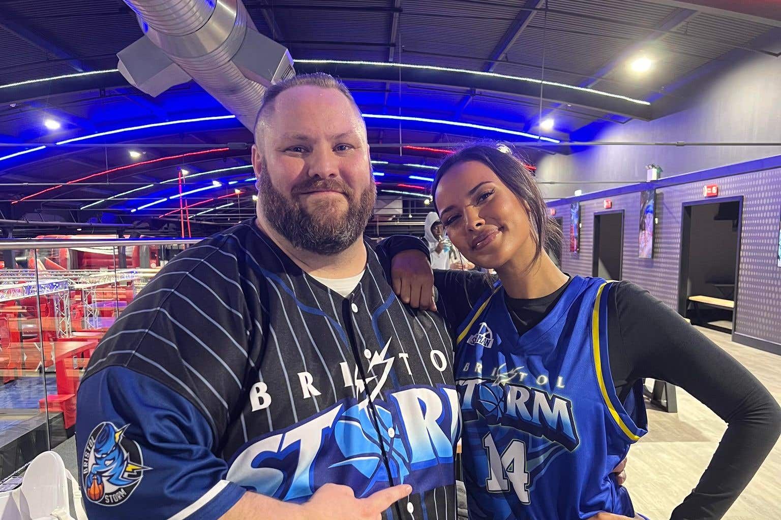 Basketball coach for Bristol Storm, David Senart, with Love Island’s Maya Jama who purchased a new minibus for the club (David Senart/PA)