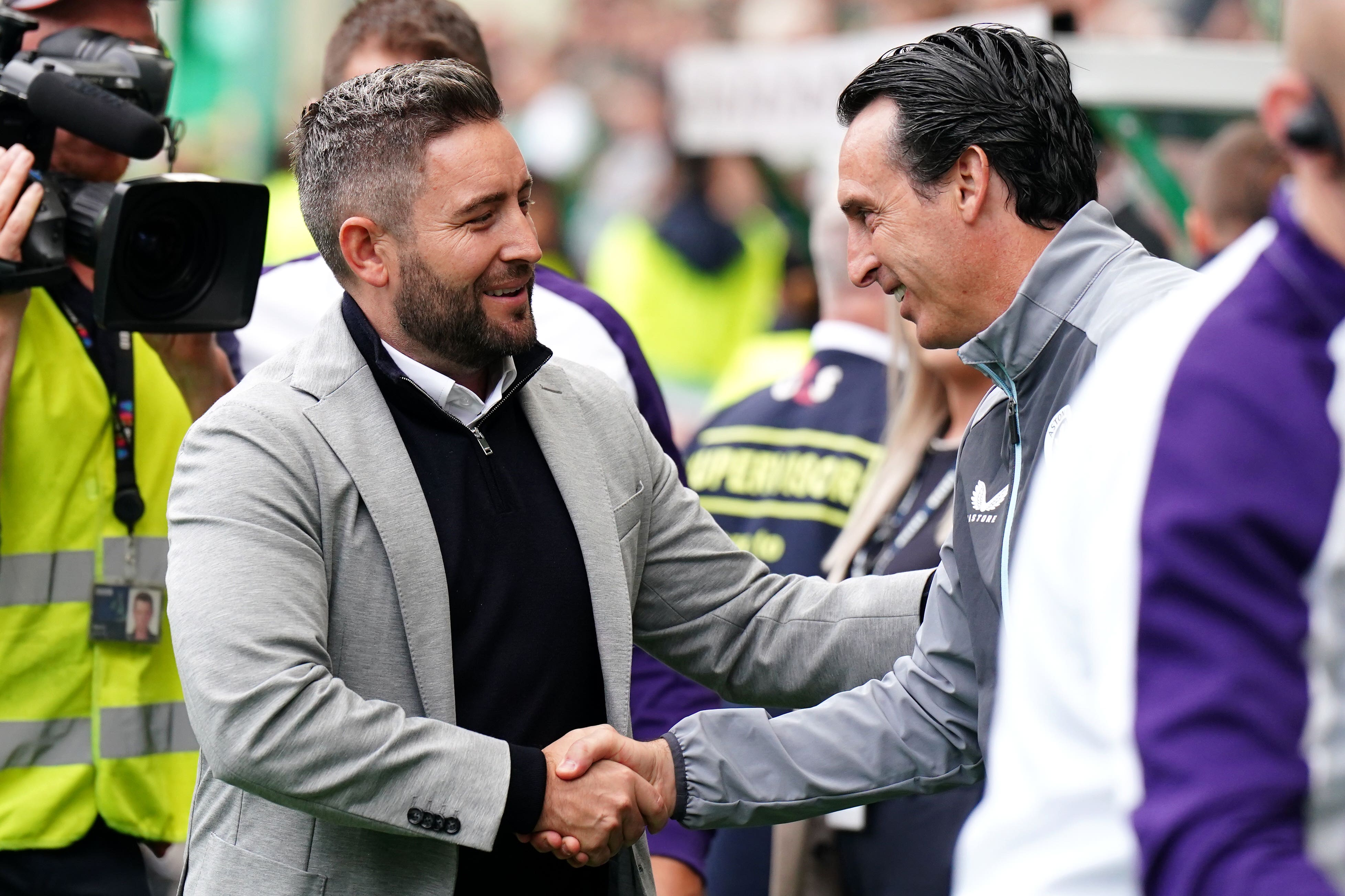 Hibernian manager Lee Johnson shakes hands with Aston Villa manager Unai Emery before the Edinburgh side’s heavy defeat (Jane Barlow/PA)