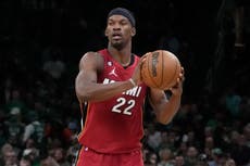 NBA's Jimmy Butler and singer Sebastián Yatra play tennis at a US Open charity event for Ukraine