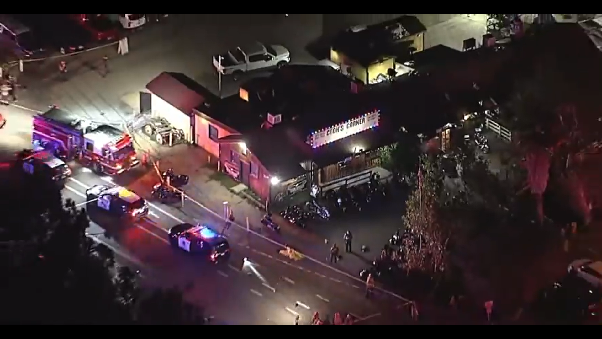 In an image from video, authorities work at the scene of a fatal shooting Wednesday, Aug. 23, 2023, at Cook’s Corner