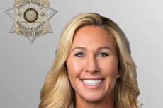 Marjorie Taylor Greene releases fake mugshot in solidarity as Trump turns himself in to Georgia officials