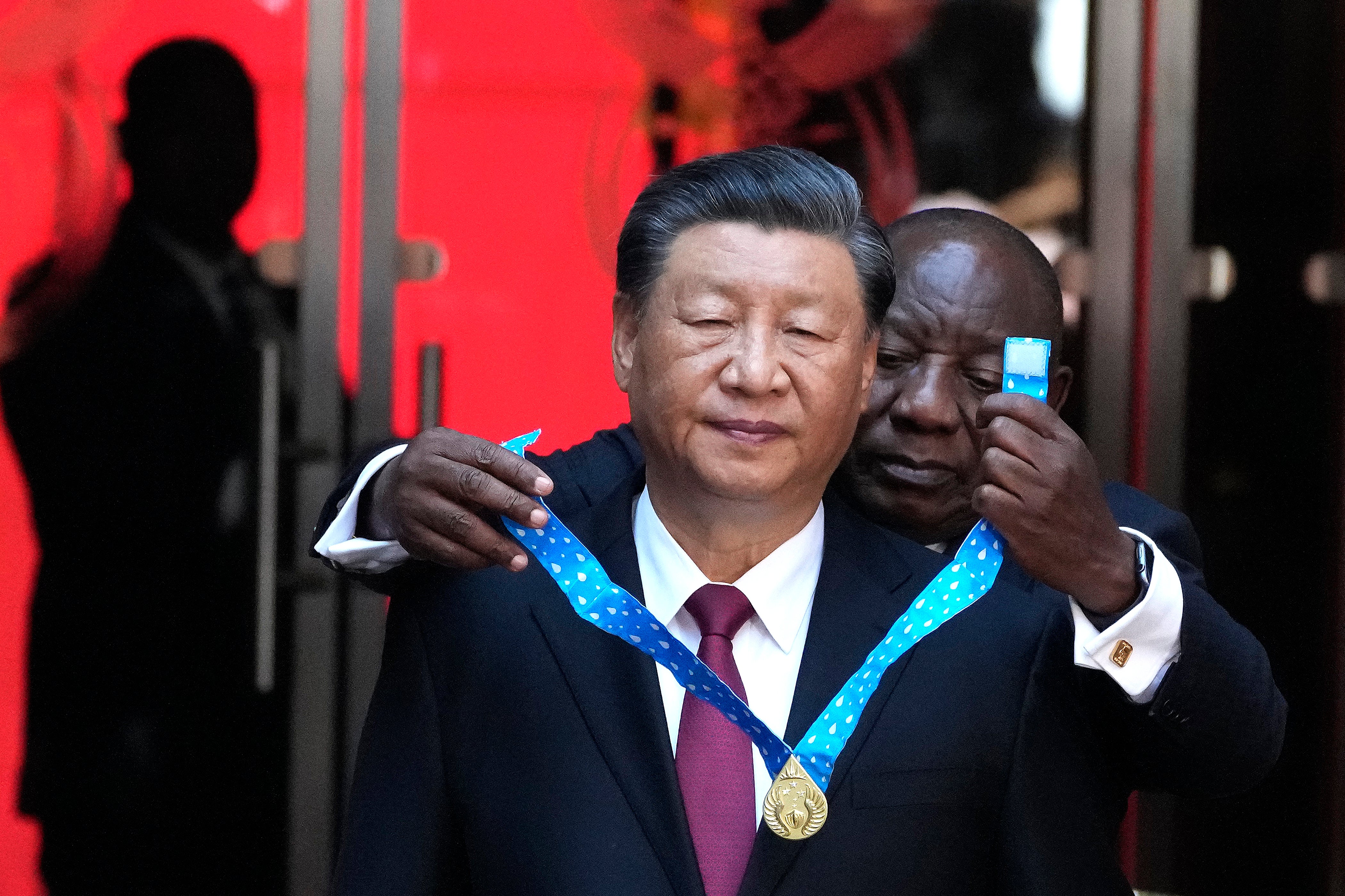 Chinese president Xi Jinping receives the Order of South Africa from president Cyril Ramaphosa in Pretoria in 2023