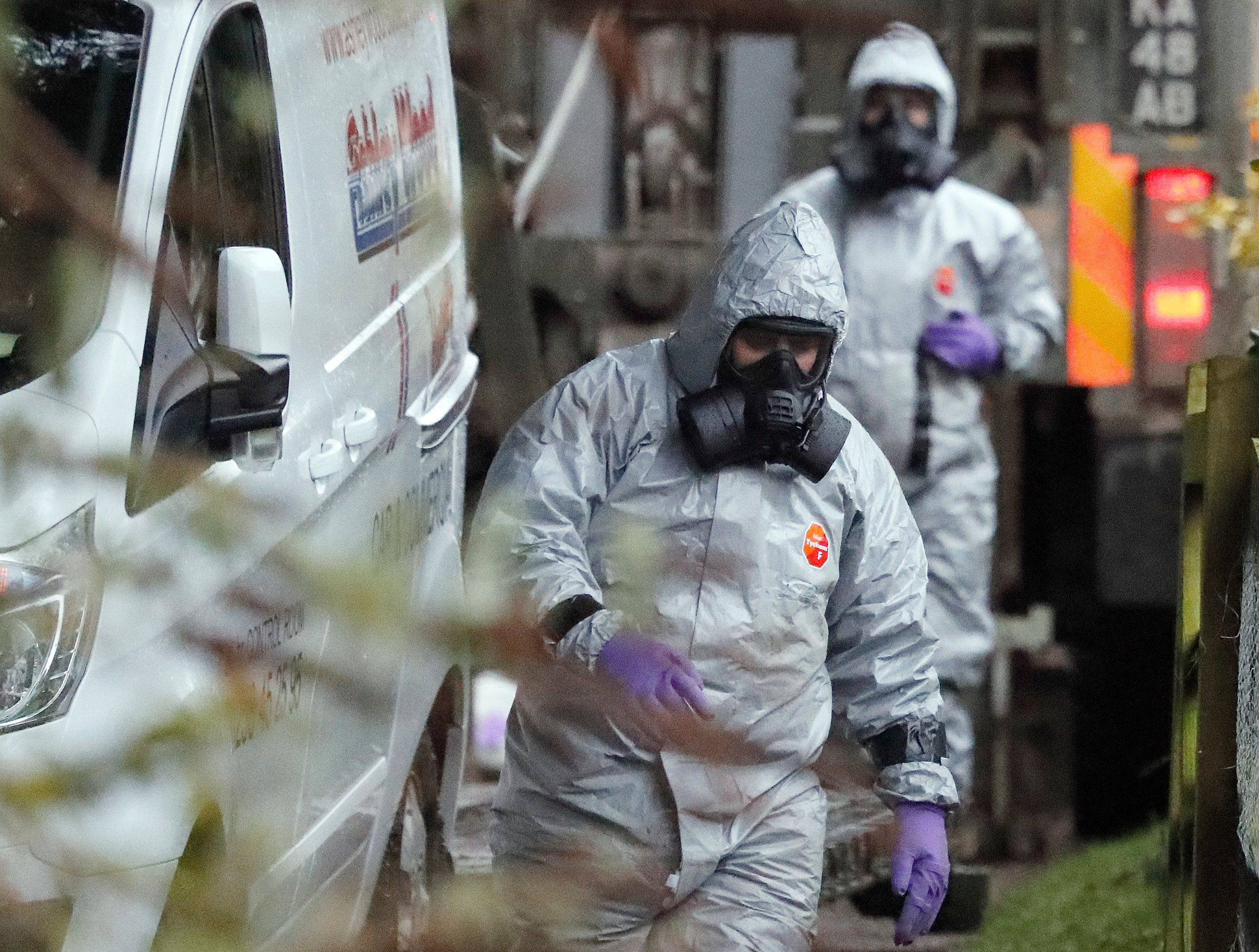 Foresic examiners investigate a scene following a Russian poisoning attempt in Salisbury