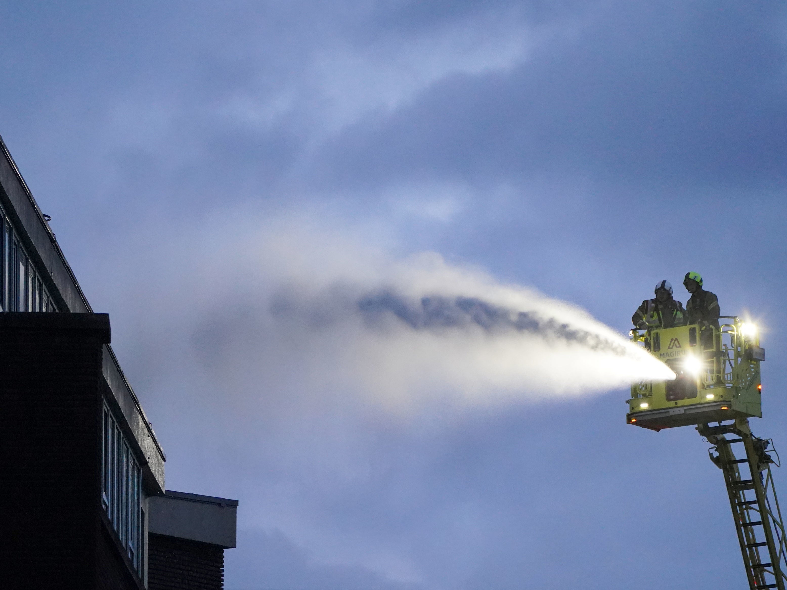 Firefighters tried to put out the flames