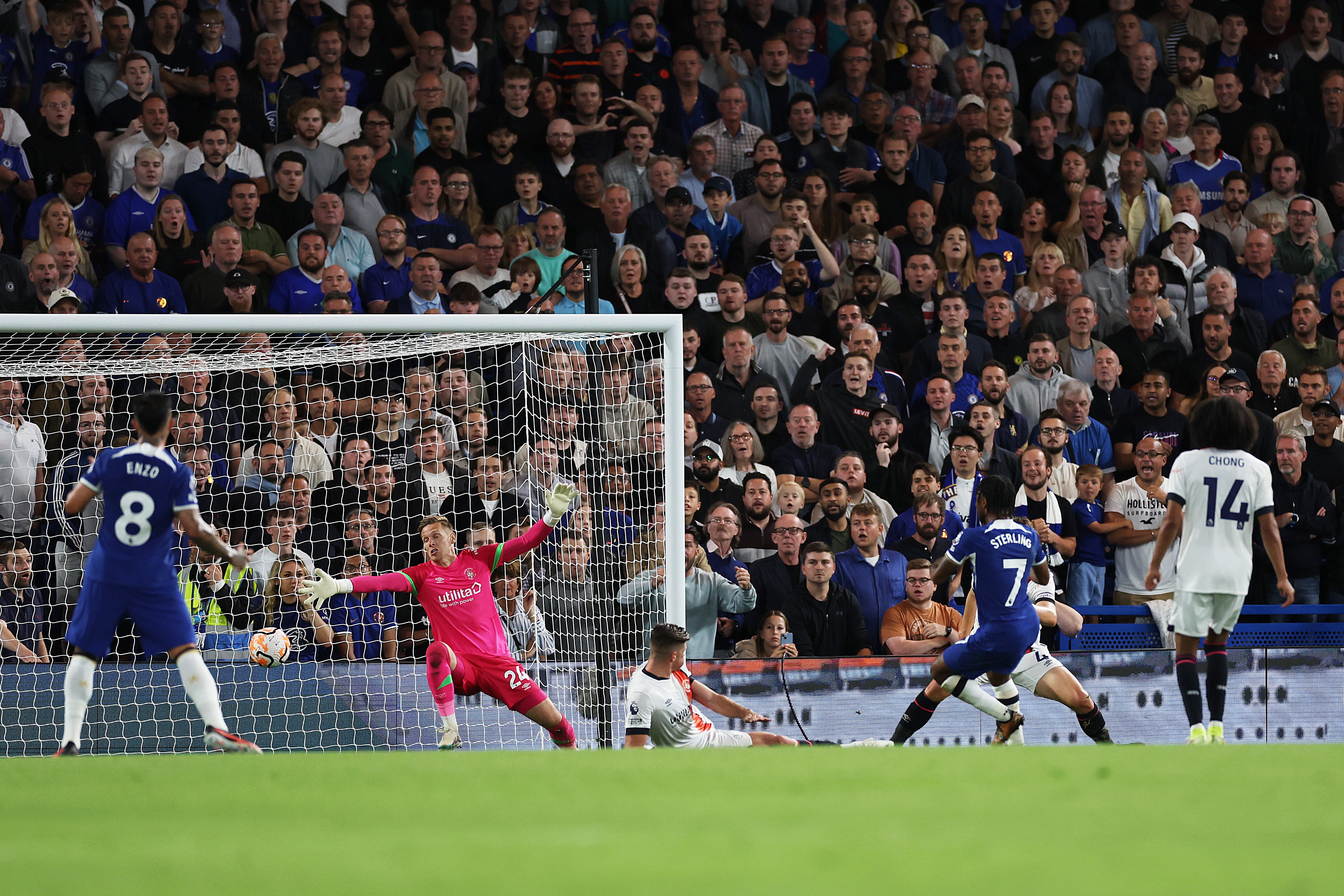 Raheem Sterling scores his second goal with a one-touch finish to beat Thomas Kaminski