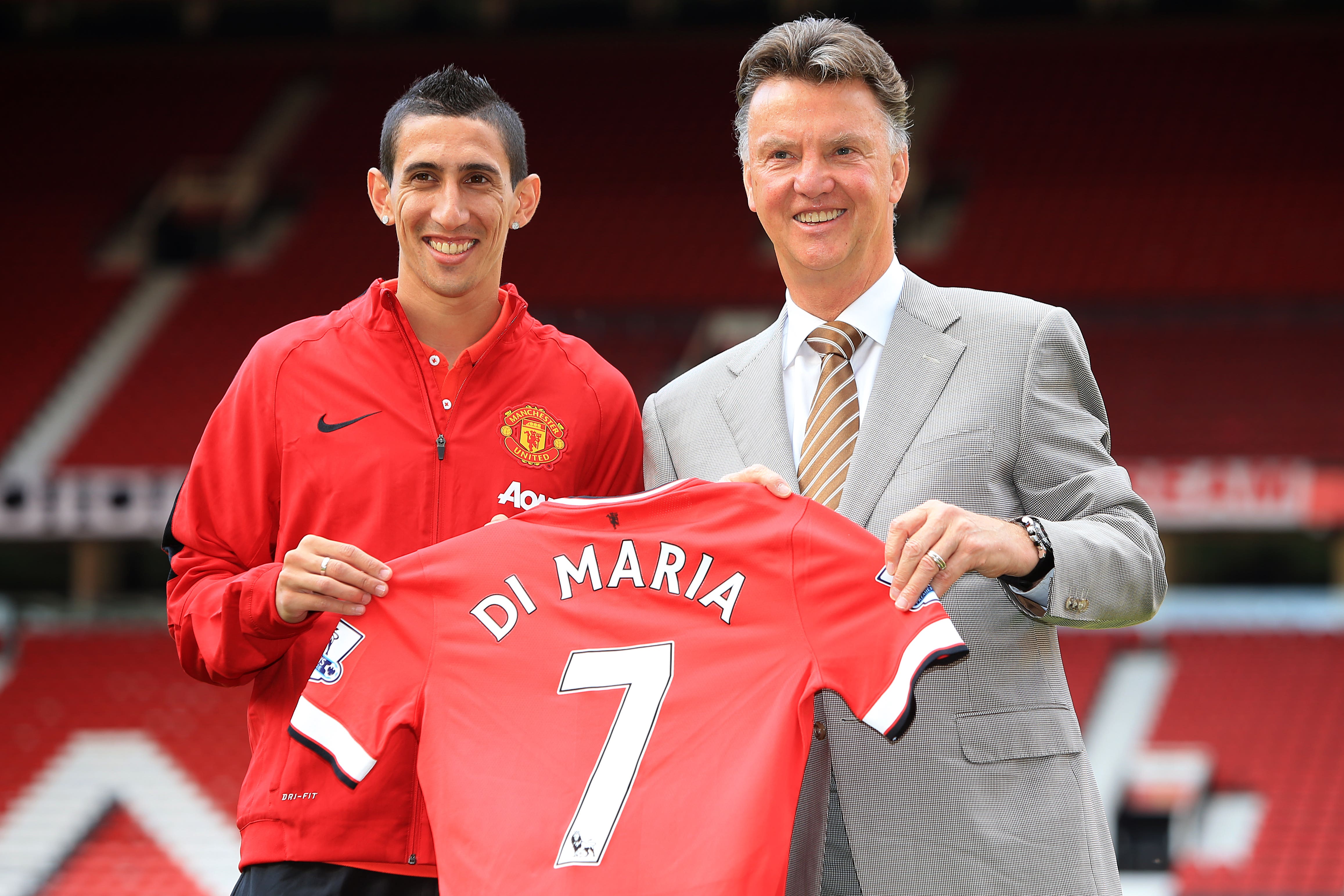 Angel Di Maria, pictured left with Louis van Gaal, completed his ill-fated move to Manchester United on August 26, 2014 (Peter Byrne/PA)