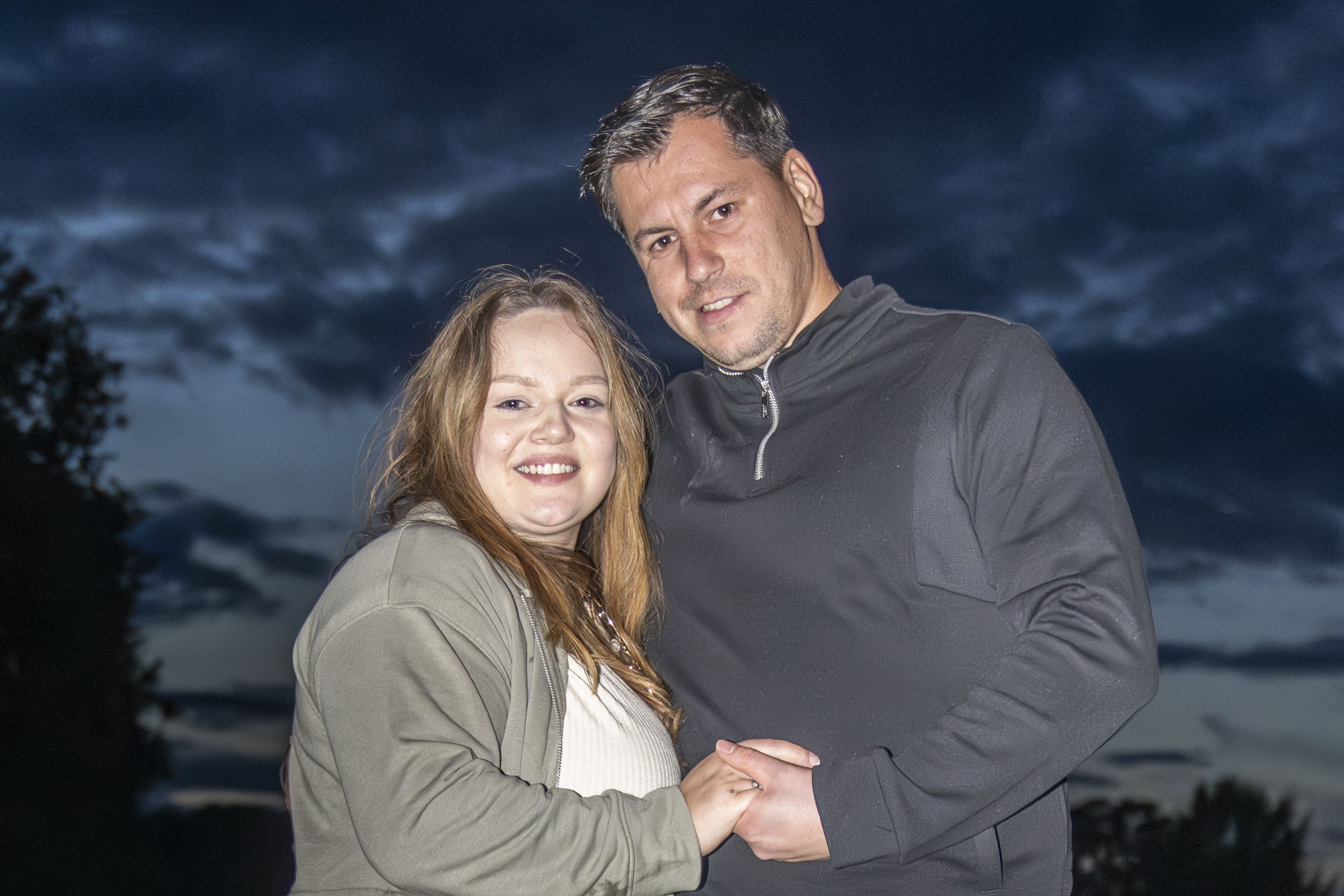 Megan Greenwood got a huge surprise when boyfriend Rhys Whelan proposed with a personalised drones message during the Fireworks Championships in North Yorkshire (Danny Lawson/PA)