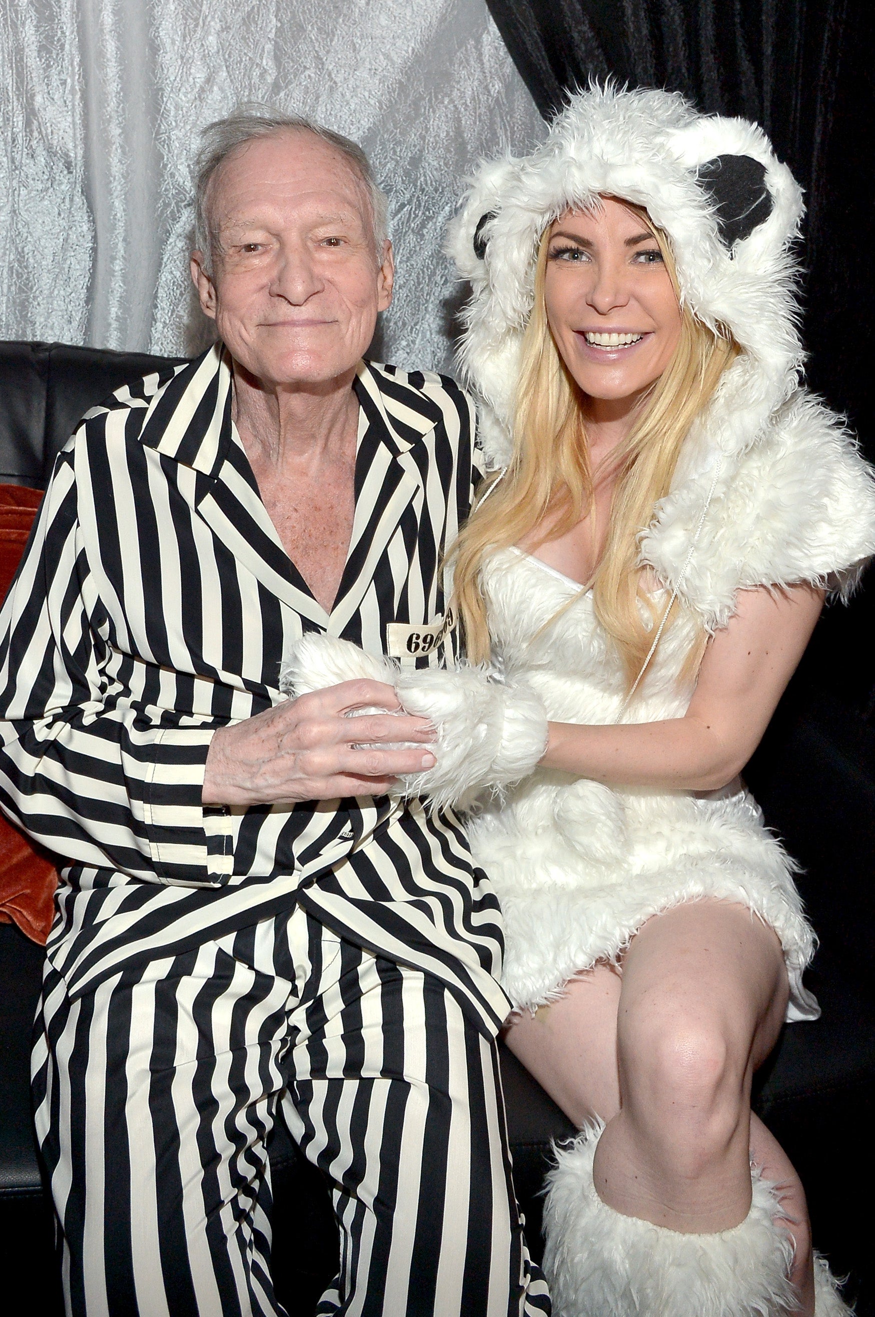 Hugh Hefner (L) and model Crystal Hefner attend the annual Halloween Party, hosted by Playboy and Hugh Hefner, at the Playboy Mansion on October 24, 2015