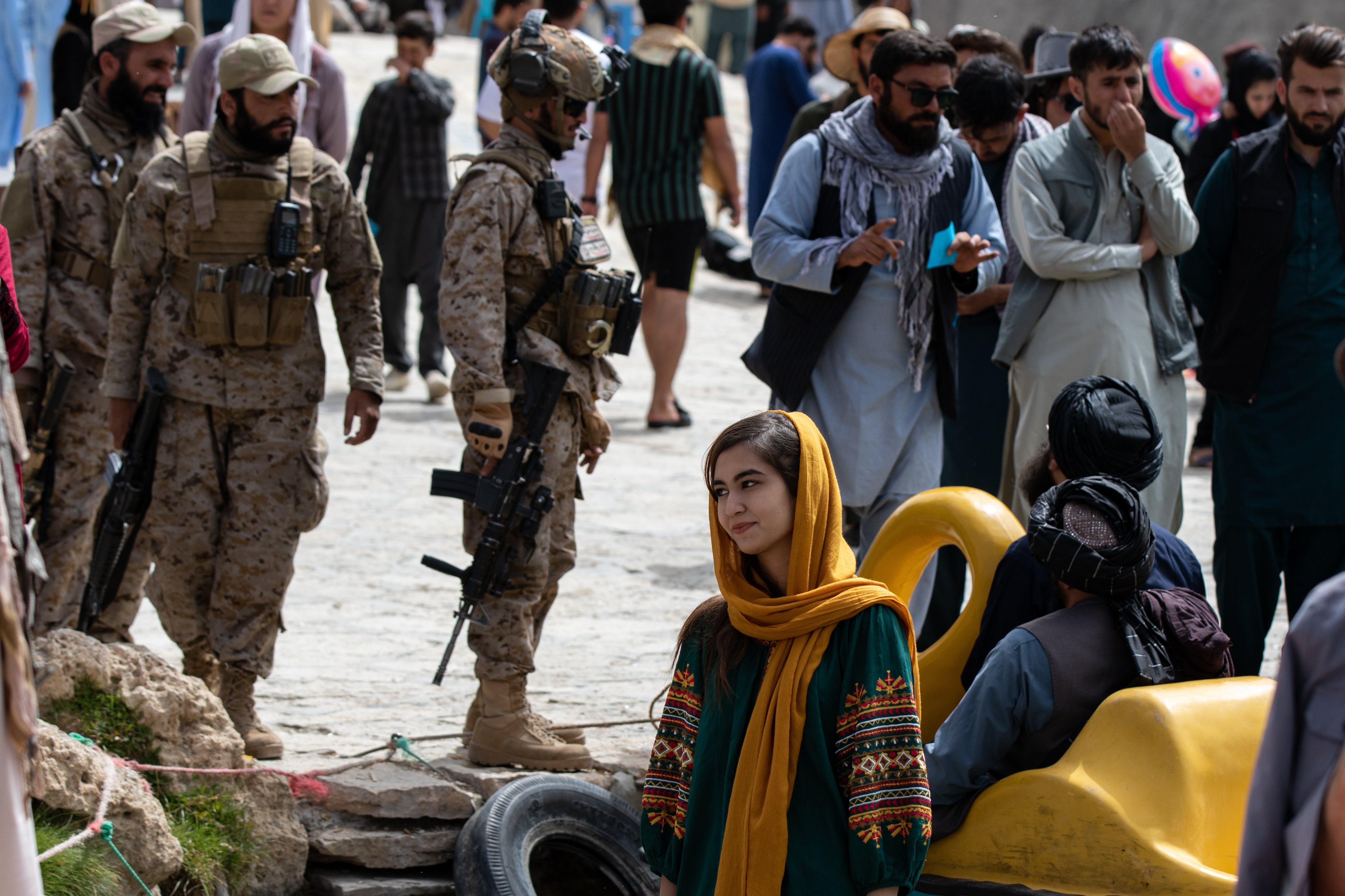 Afghan families and Taliban members visit one of the lakes in Band-e Amir