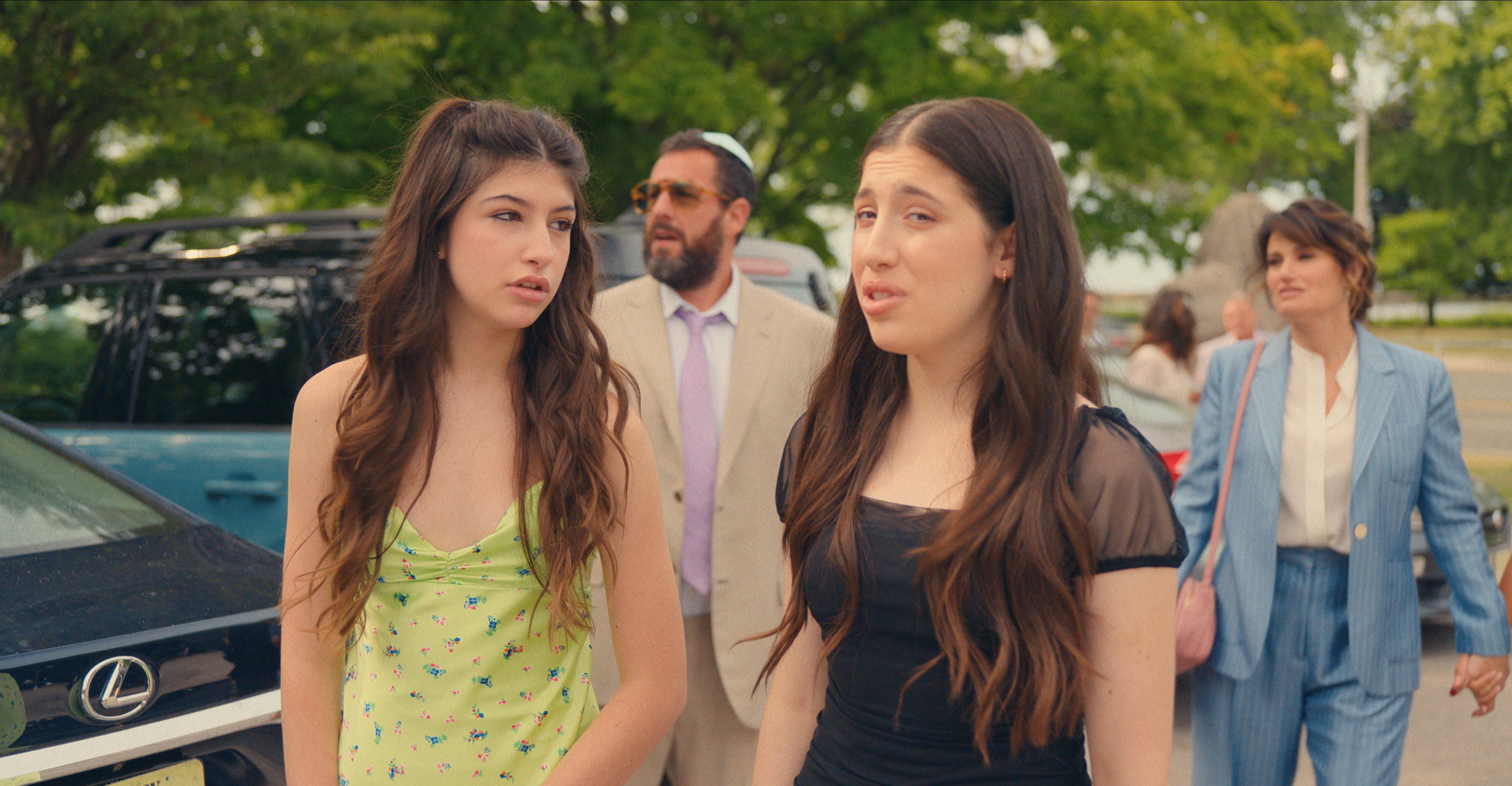 Sunny and Sadie Sandler (foreground), with Adam Sandler and Idina Menzel