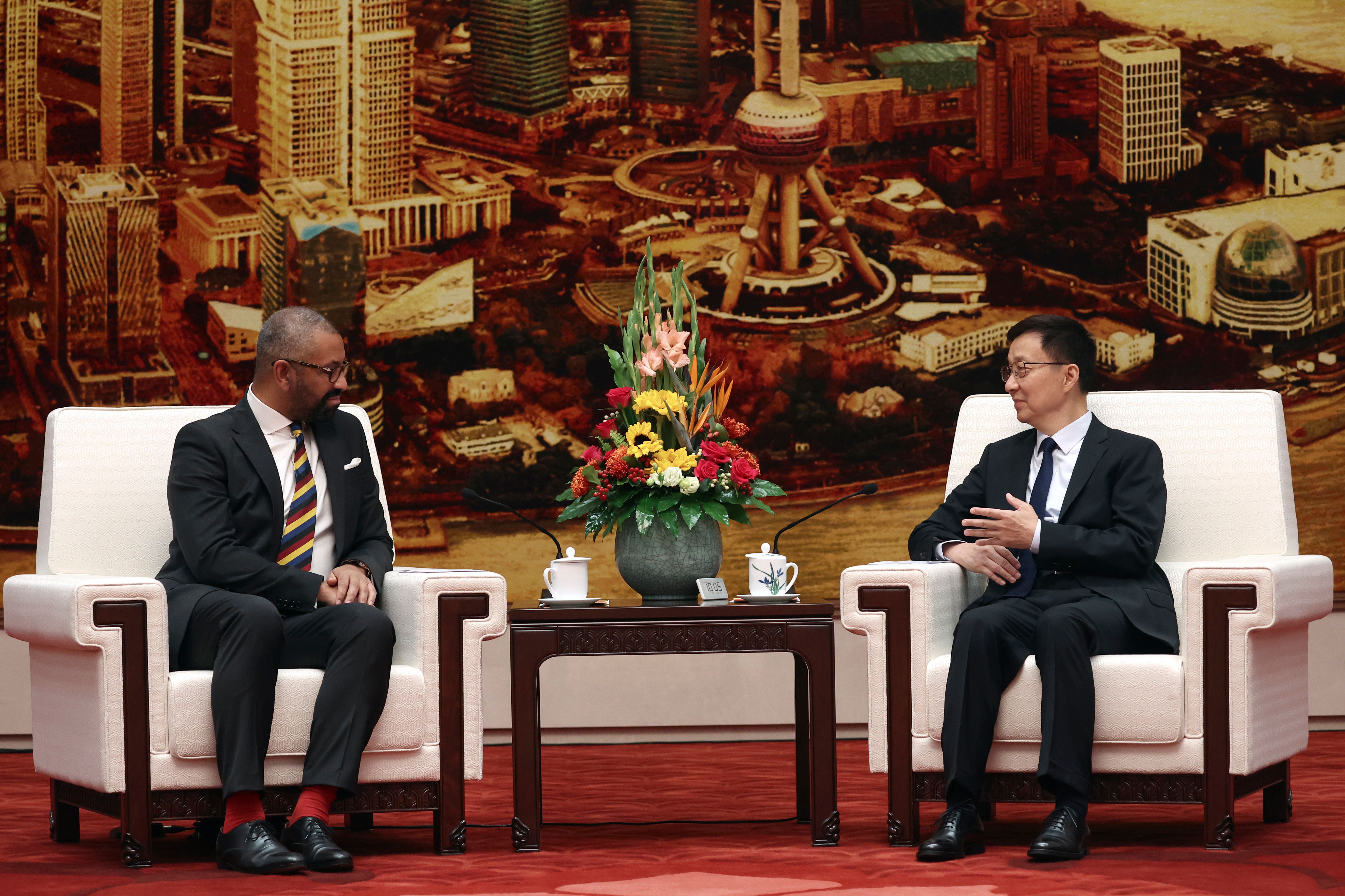 Foreign Secretary James Cleverly, left, had a face-to-face meeting with Chinese vice president Han Zheng (Florence Lo/Pool Photo via AP)