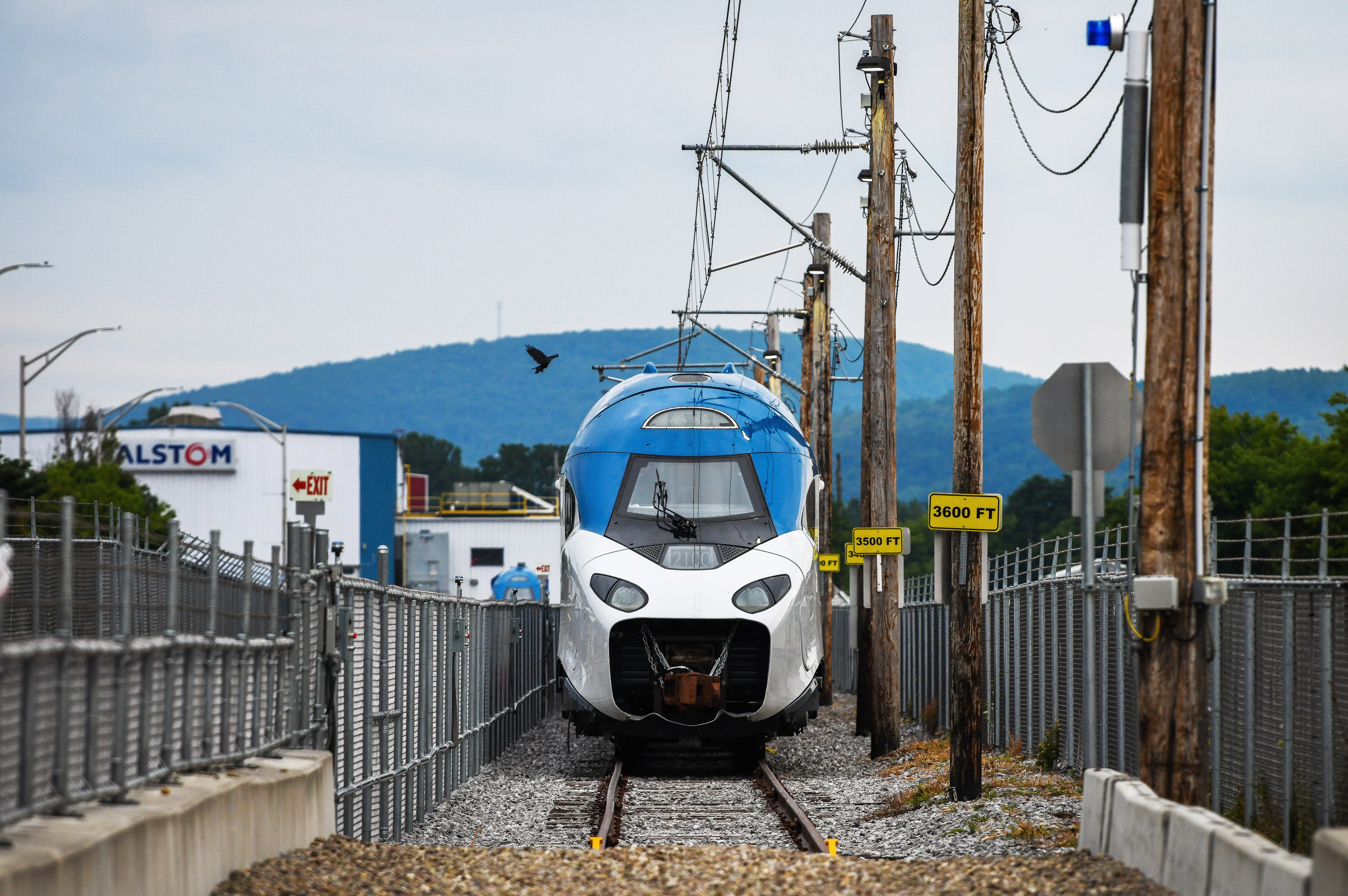 An Amtrak Acela power car and trainset on a test track at the Alstom facility in Hornell, New York